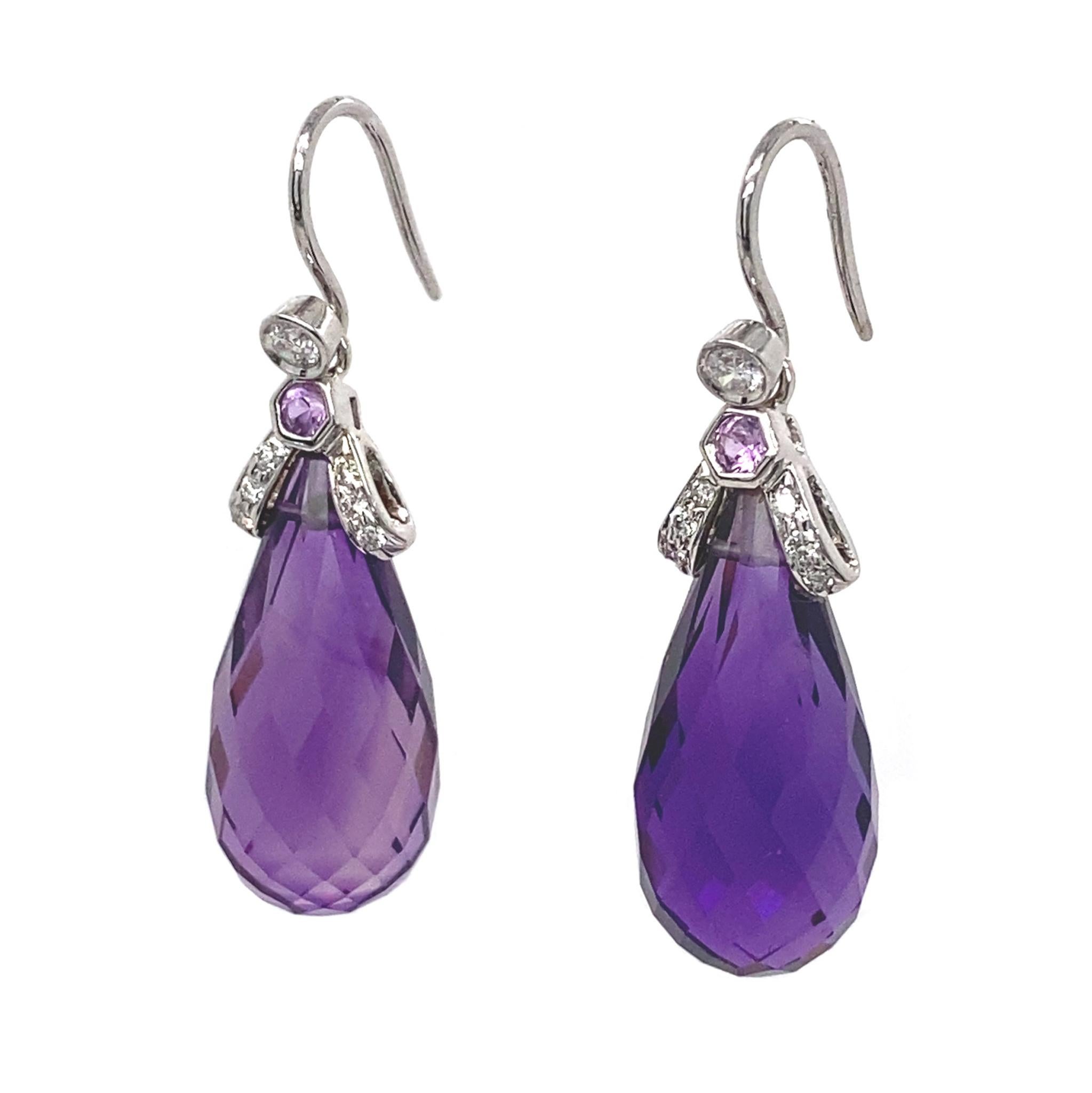 A pair of rich violet Amethyst drop earrings that carry the shape and symbolism of the Old World fruit, the Aubergine. In Chinese culture, it even represents good health, long life and a promising career growth. The drops of 2 Amethysts (totalling