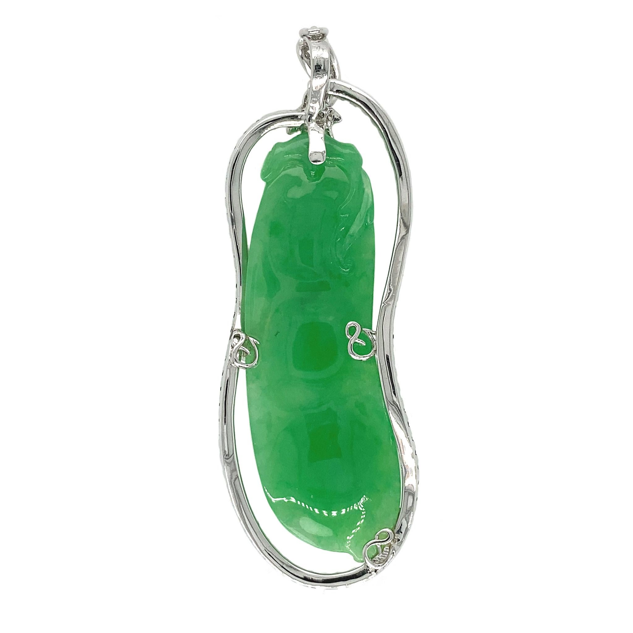 In ancient Jadeite culture, the carved Aubergine carries a few important symbolic interpretations: good health, a long life and promising career growth. This natural A-grade, lustrous green jaidete carving, weighing 21.73 carats and certified by