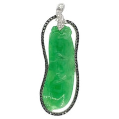 Dilys' 21.73ct Aubergine Jadeite Carving & Black Diamond Pendant in 18K Gold