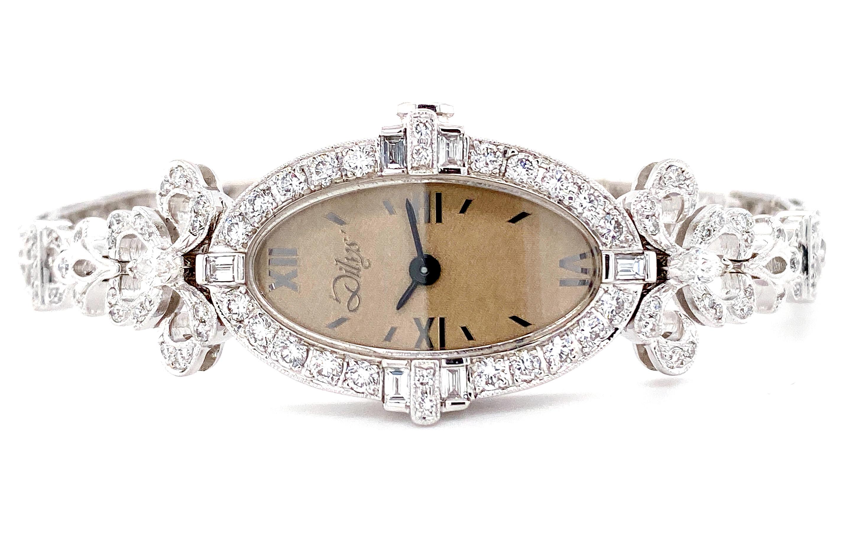 Inspired by the Art Deco movement, Dilys’ exceptional Swiss quartz movement diamond watch in 18 karat gold exhibits beautiful intricacy with detailed cutouts and outlines throughout. This timepiece speaks for itself and is a work of wearable art.