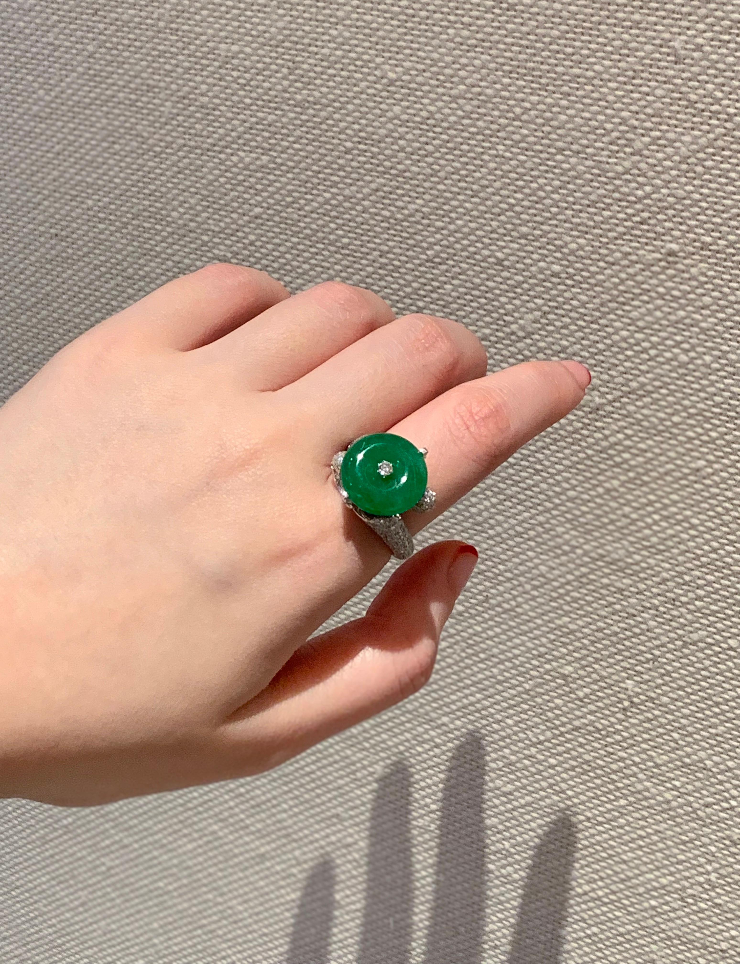 Jade, the stone that protects and nourishes the heart energy is often worn in Chinese culture to calm its wearer. As an engagement ring, it is the perfect symbol to protects one's bond and commitment. This natural A-grade, lush green 'peace buckle'