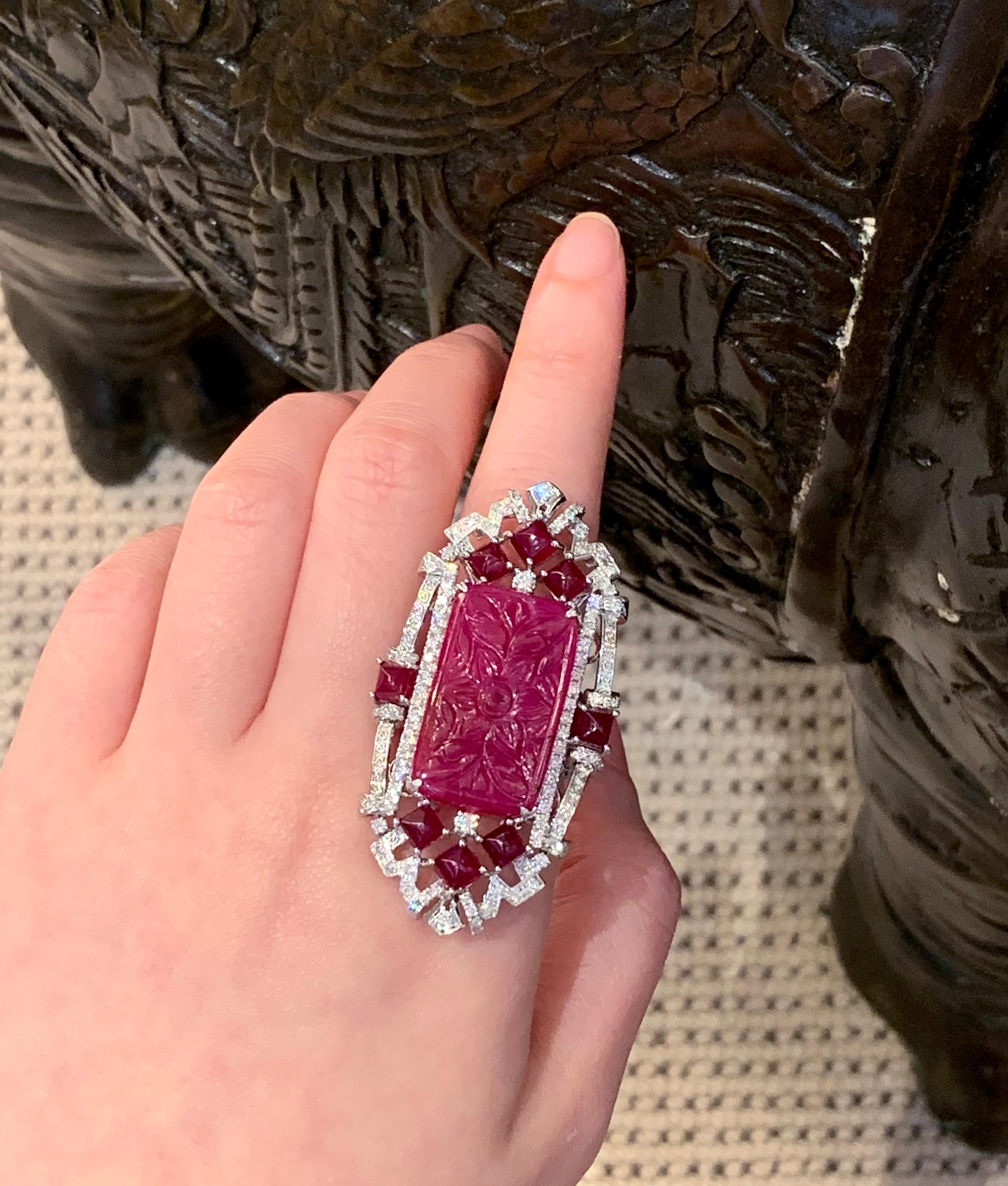 Dilys’ brings back the drama to wearable fine jewelry with another Art Deco inspired creation, featuring the one-of-a-kind GRS-certified 16.43-carat carved ruby centrestone. This piece is designed by Dilys’ to be worn as both a statement-making ring