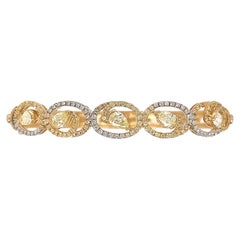 Dilys' Fancy Colour Diamonds & White Diamond Bangle in 18K Gold