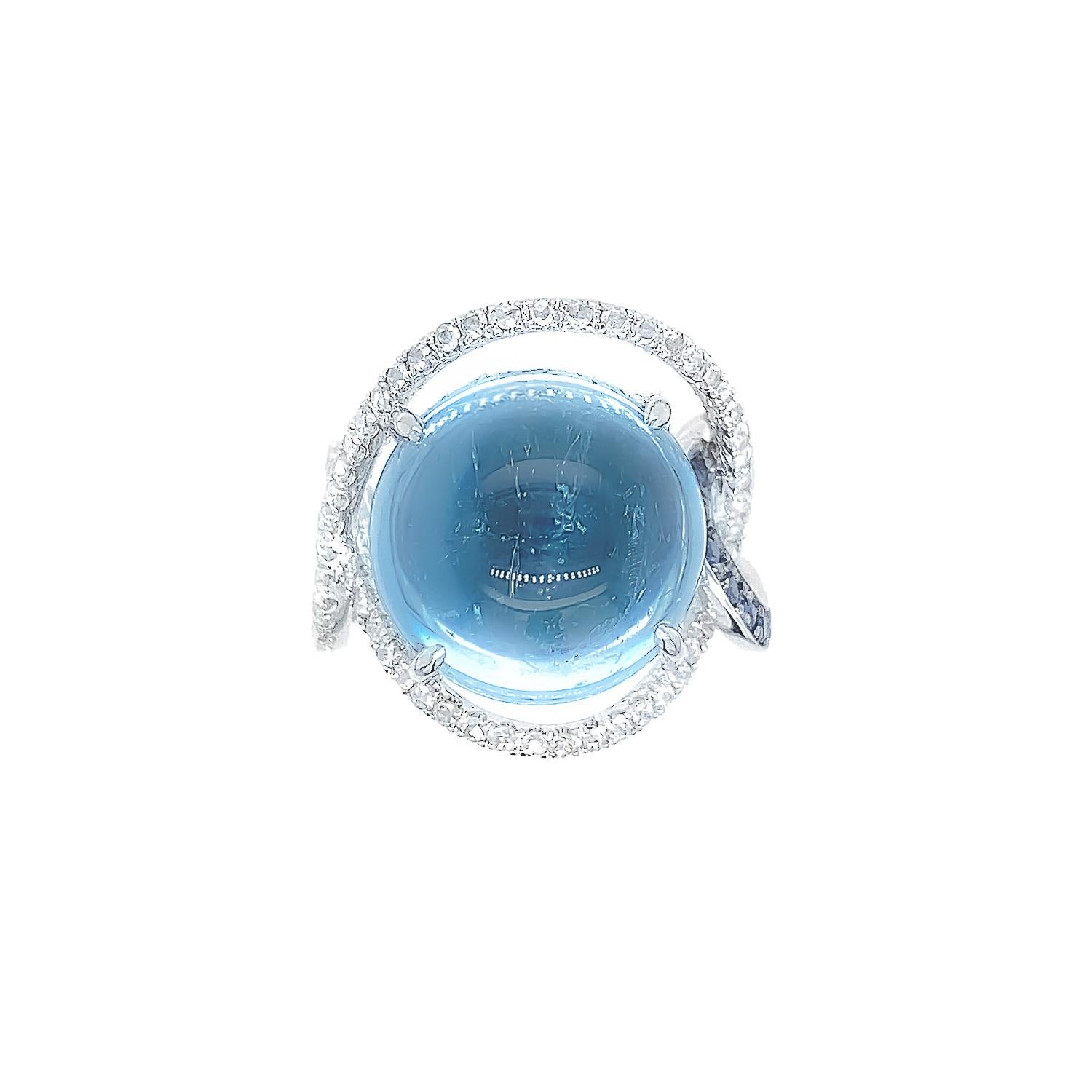 Alll-natural gem-grade, transparent Aquamarine with unique 'birthmarks' within its globe-like form, set in a flowing and lively silhouette with 18K black and white gold. Set by the House of Dilys' skilled craftsmen, trained and attuned to the