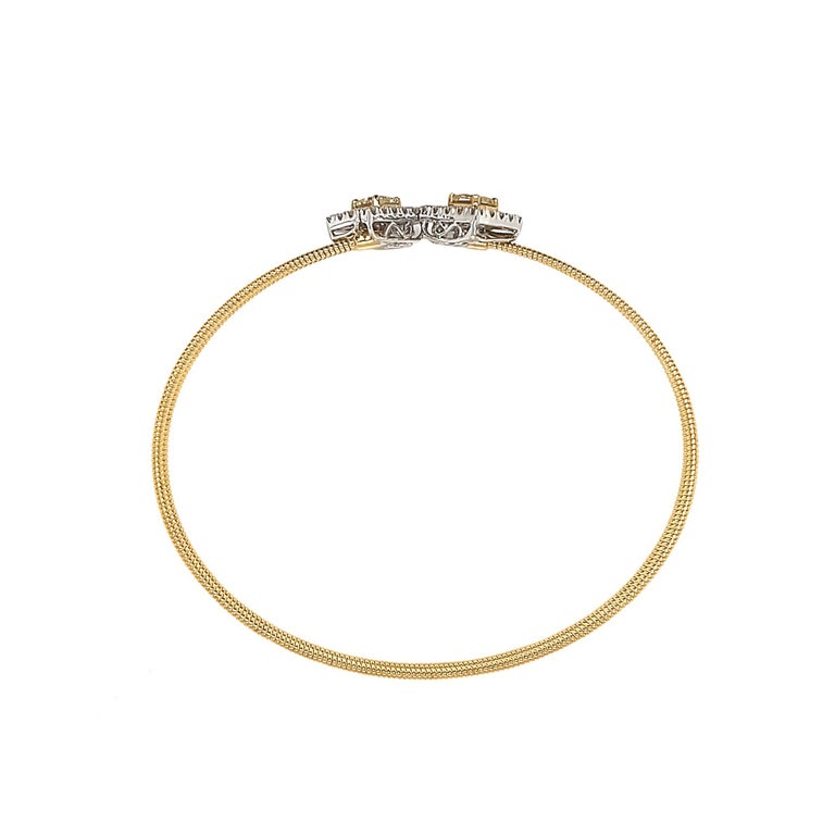 Dilys' Fancy Colour & White Diamond Titanium Bangle embodies effortless glamour – featuring an elegant design with the luxuriously bold base material of titanium. The design choice of titanium is what gives this piece its comfort fit. 

32