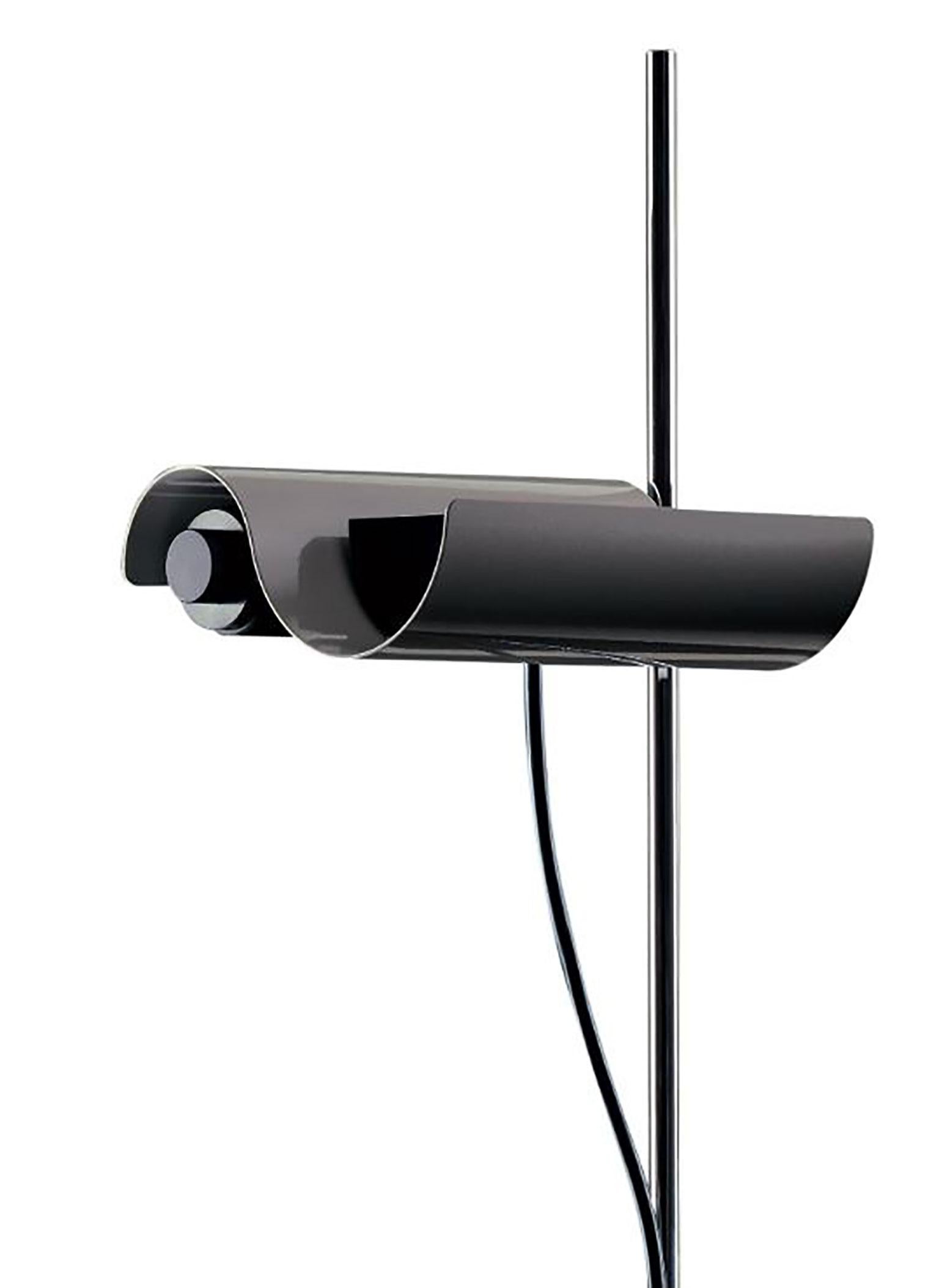 Dim floor lamp is designed by Vico Magestretti for Oluce. Vico Magistretti was a picture of mid-20th century design, operating on everything from architectural and automated commissions to products for the home. During his career, he won the