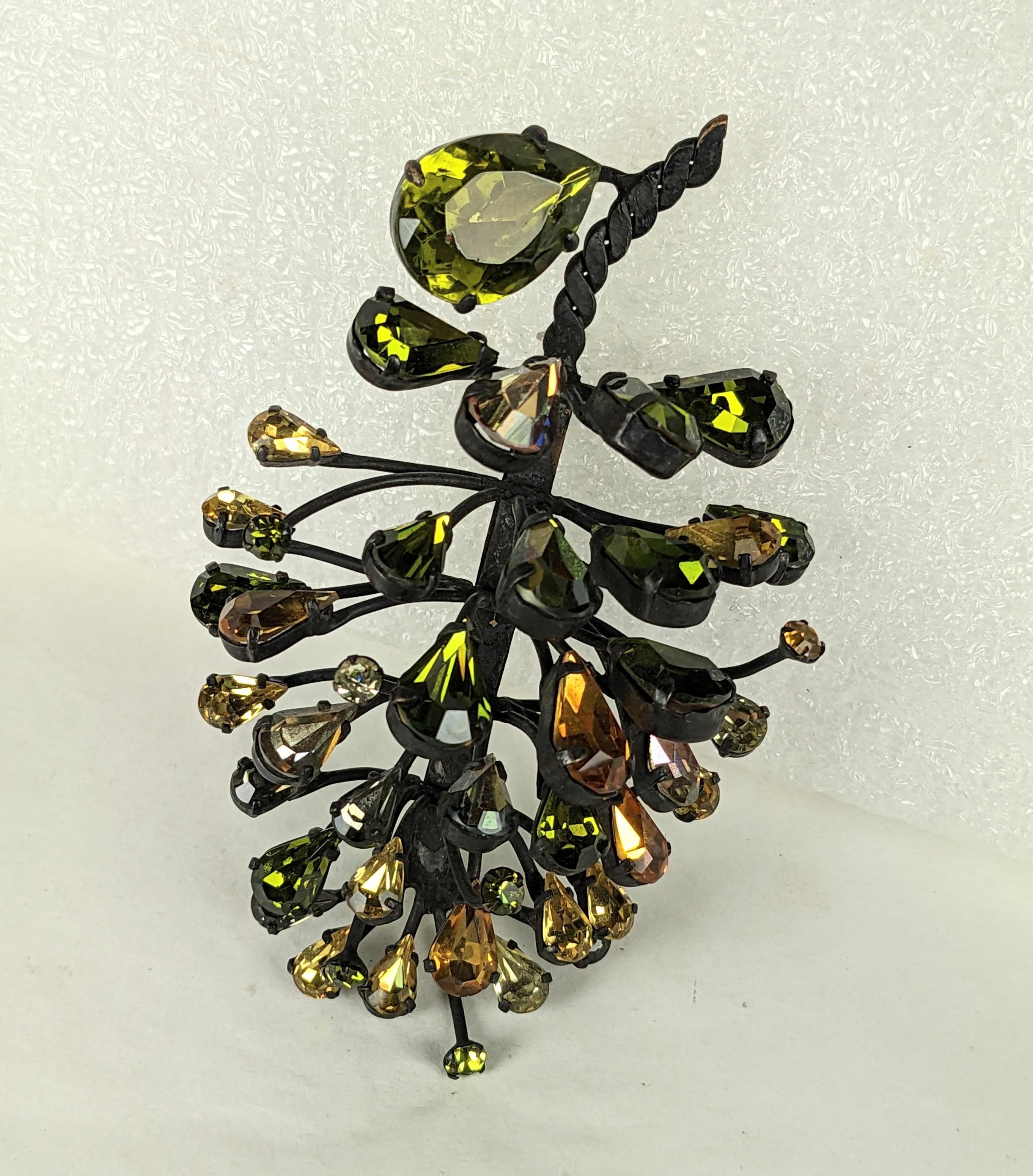 Amazing Countess Cis Jeweled Pine Cone Brooch from the 1950's. Very dimesional and completely hand made of twisted metalwork and colored crystals in tones of citrine and peridot, all set in blacked bronze finish. 1950's France. 3.5