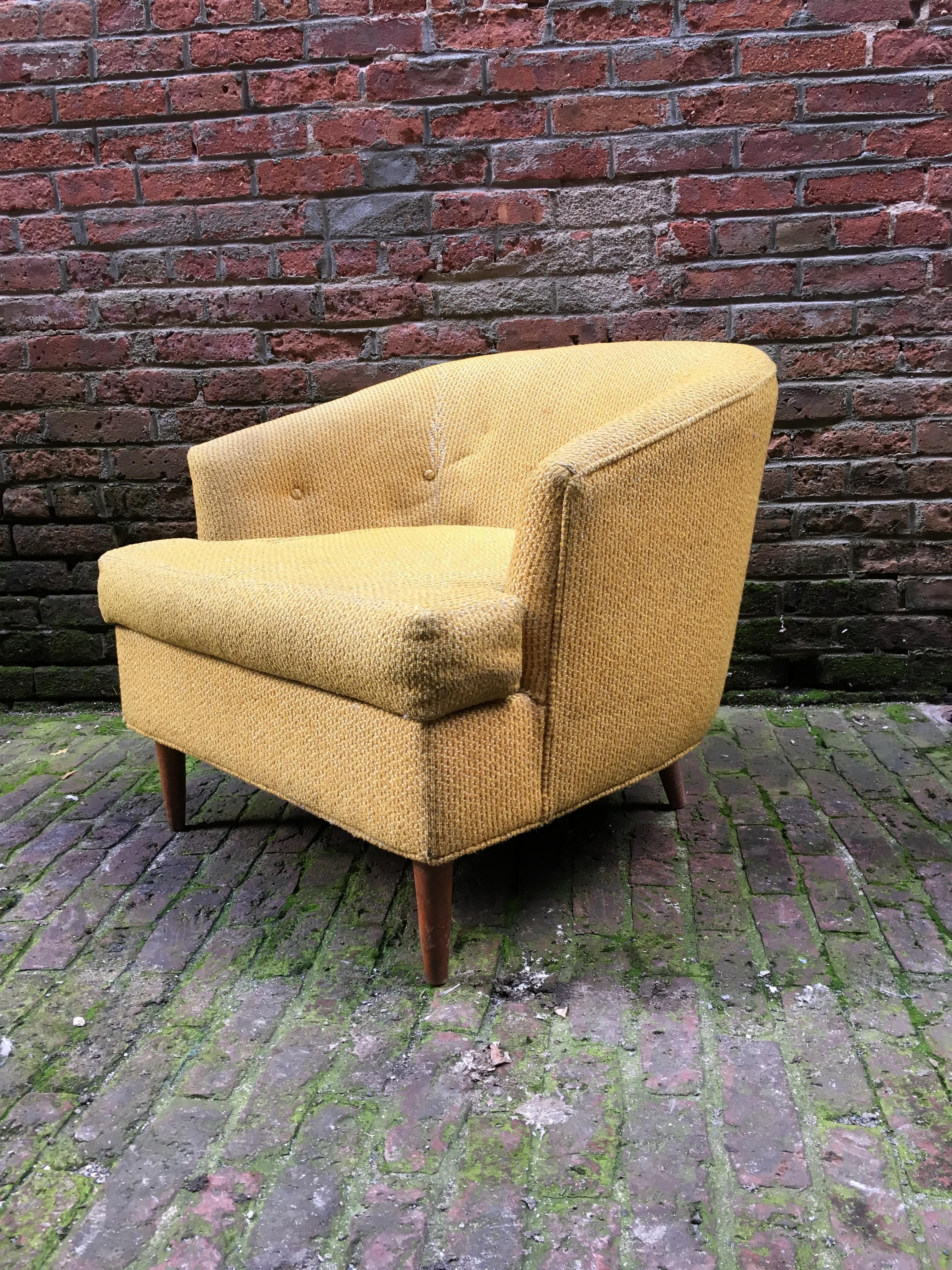 Retailed or imported by Selig, circa 1960-1970. Diminutive barrel back lounge chair, which is probably of Scandinavian origin. Upholstered on four tapered legs. Original yellow and white upholstery. 

Measures: 30