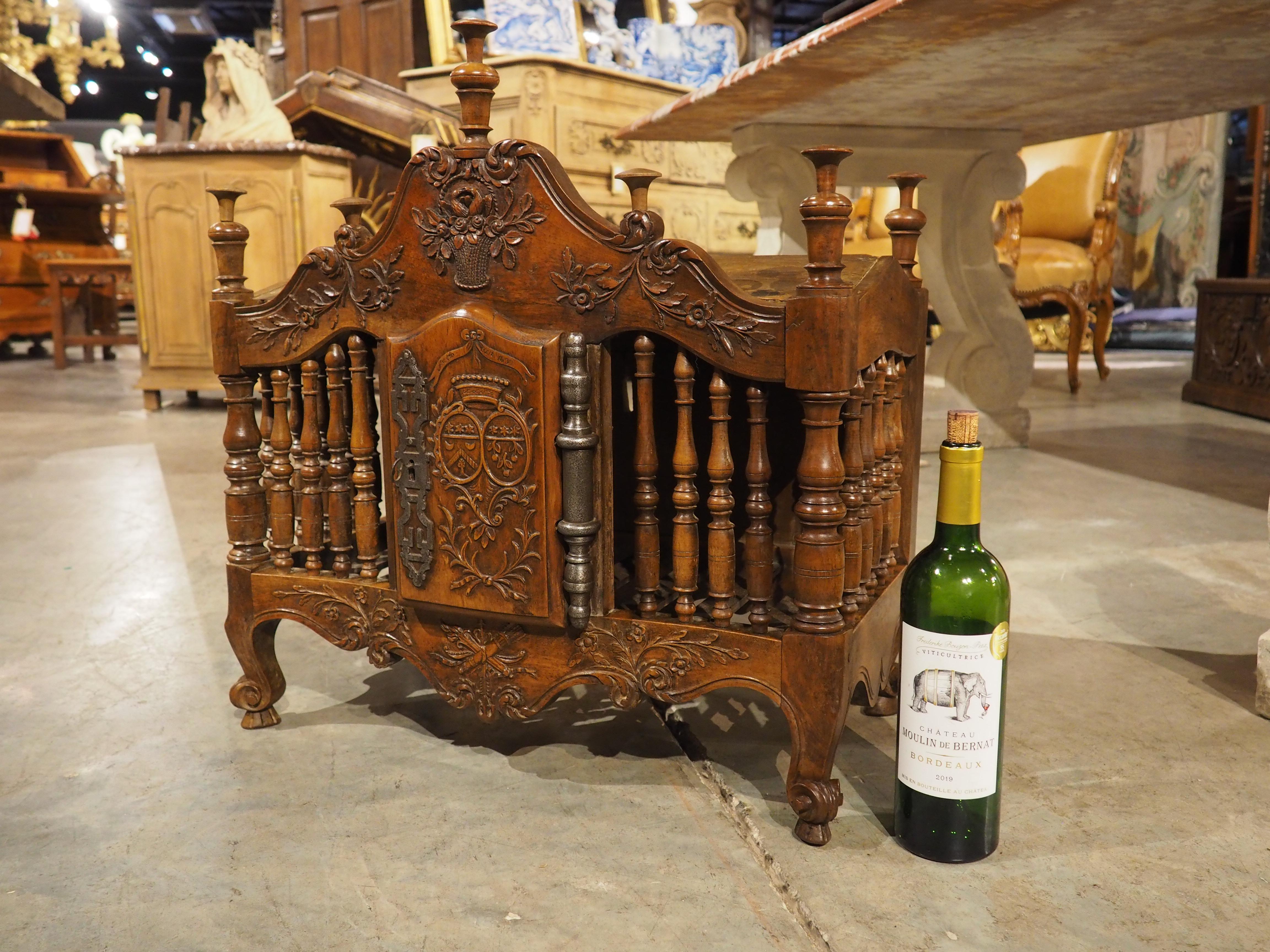 More information coming soon…

Unusually sized panetiere from France, dated 1839.  Hand-carved walnut, with floral and foliate motifs and a double coat of arms on the door.