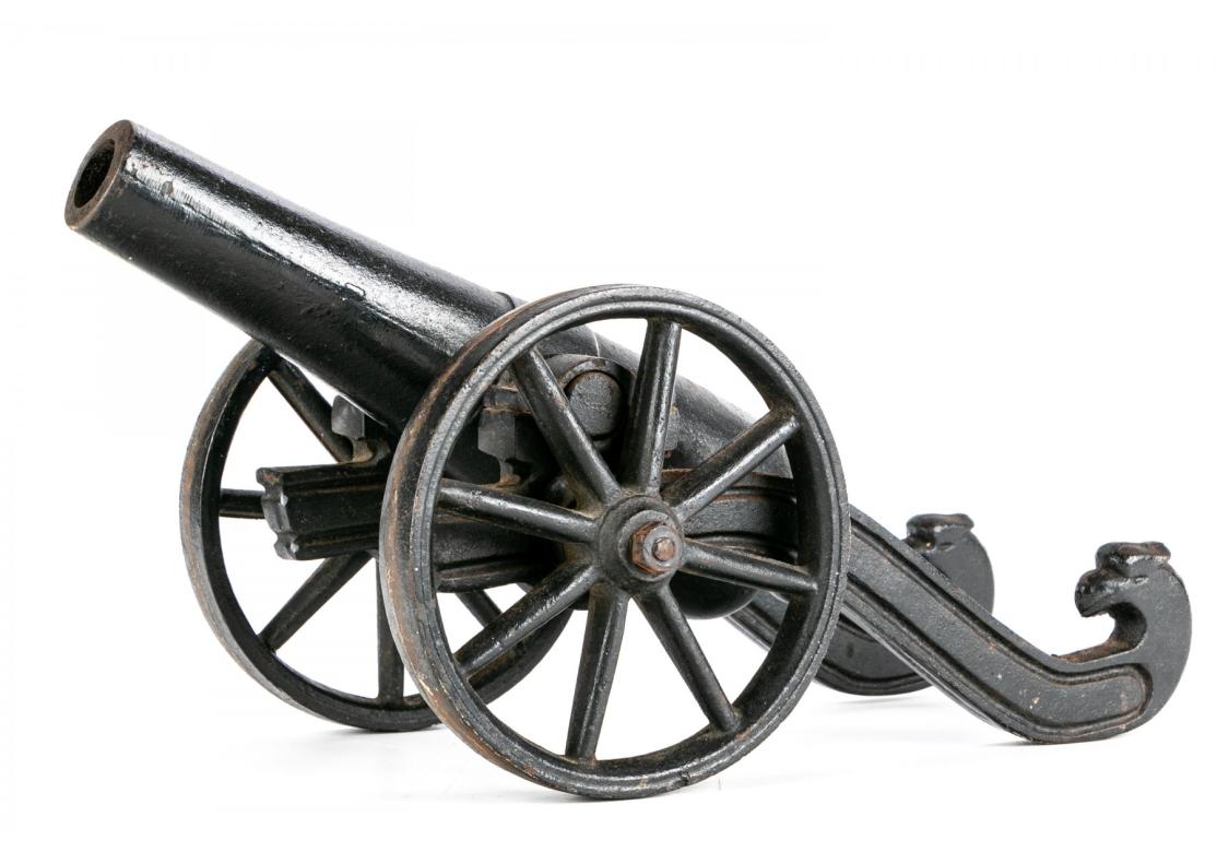 American Classical Diminutive Antique Iron Model Cannon For Sale