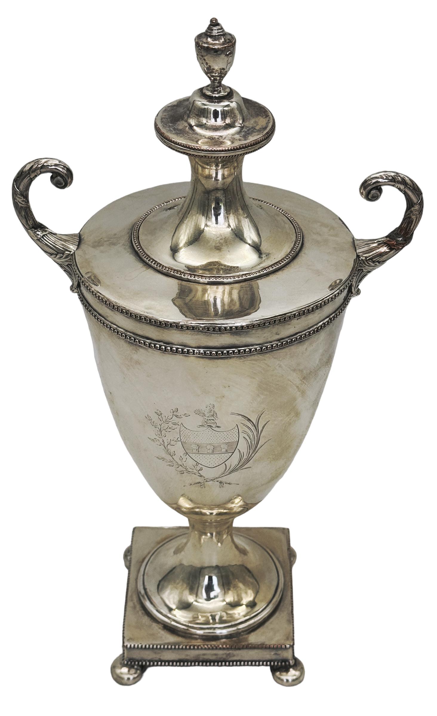 Diminutive Antique Sheffield Plate Armorial Tea/Cider Urn, Style Matthew Boulton, England, Circa 1800-1820

A Diminutive Antique Sheffield Plate Armorial Tea/Cider Urn from England, dating circa 1800–1820, crafted in the style of Matthew Boulton.