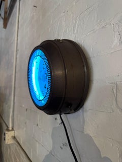 Diminutive Art Deco "blue" Neon Spinner Clock.