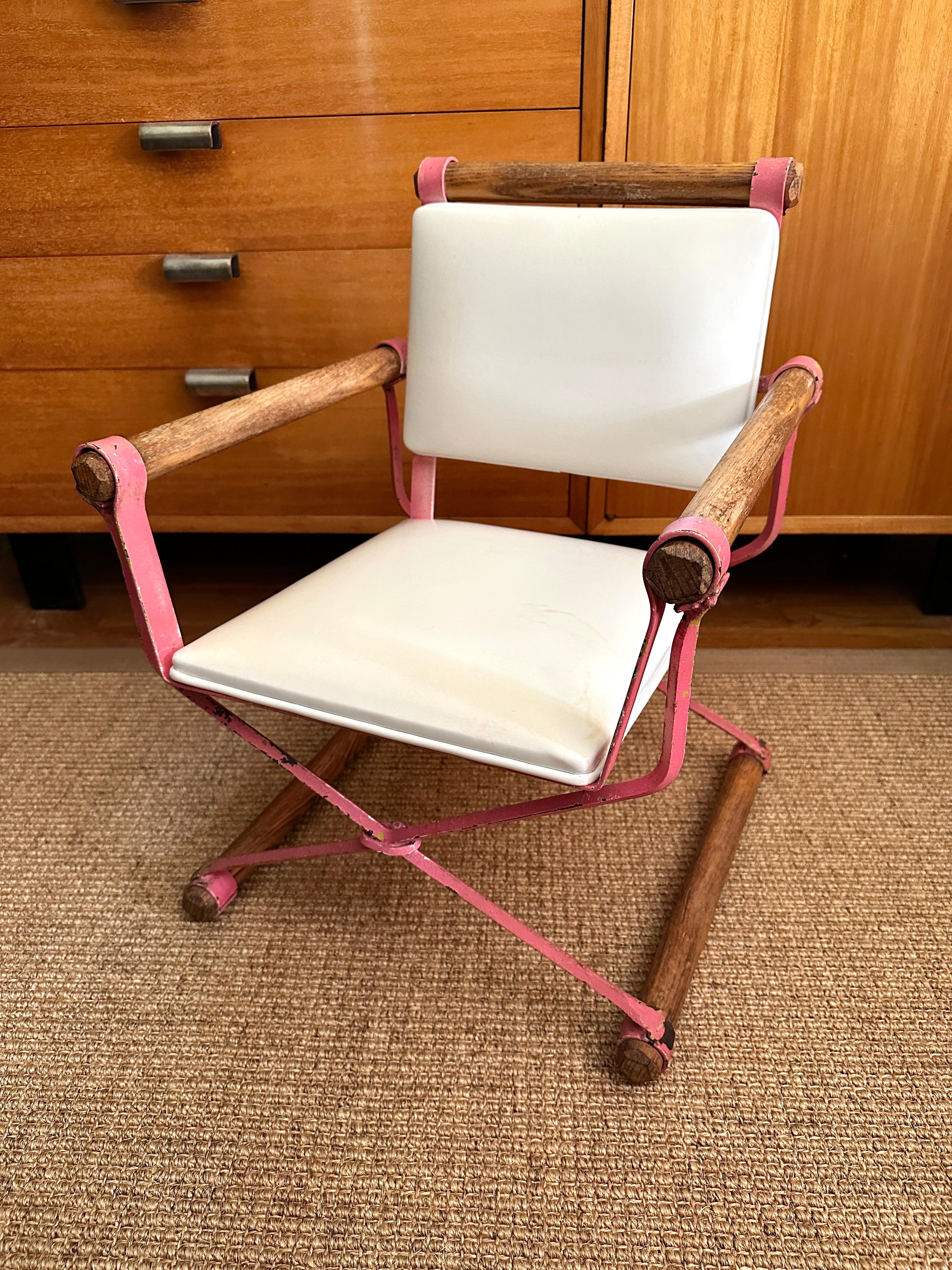 A diminutive childs chair designed by Cleo Baldon for her own Terra furniture company. Cleo Baldon began her career by designing swimming pools for homes throughtout southern California. She later branched out and opened her own furniture company,
