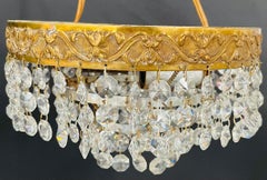 Diminutive French Regency Style Crystal and Brass Chandelier