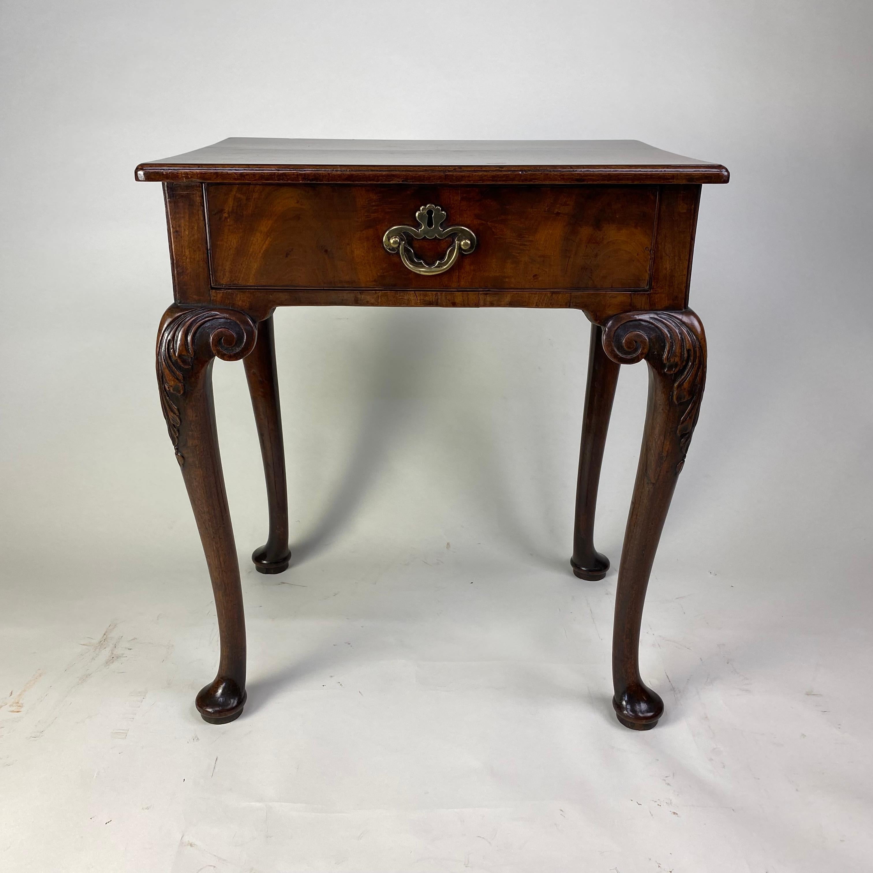 An exceptionally rare and special Geoge II period walnut side table of beautitul small proportions in 'untouched' original condition. This outstanding little side table is one of the prettiest and most desirable pieces of furniture I have ever owned