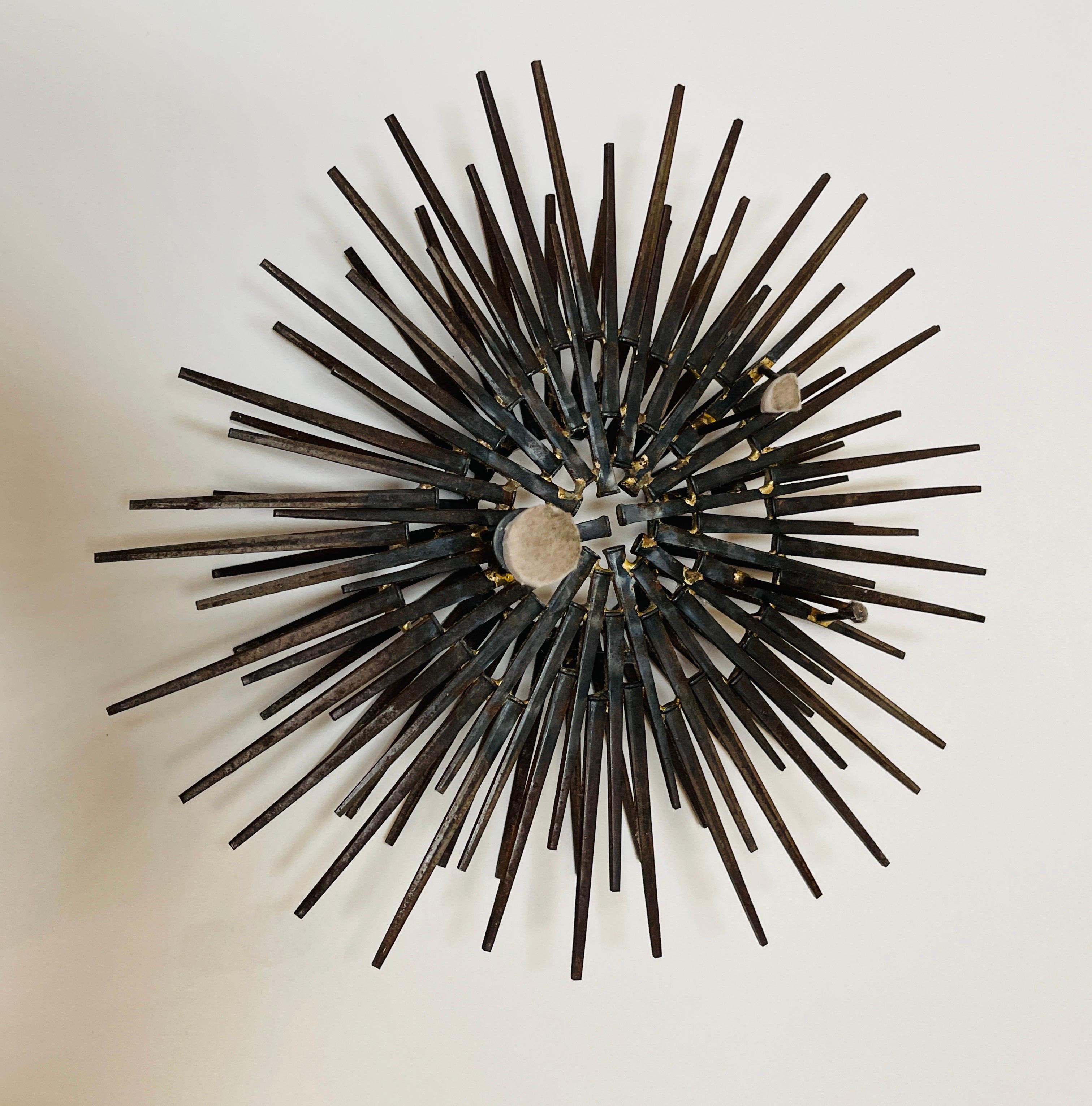Forged Diminutive Gilt Iron Two-Tier Sunburst Wall Sculpture by William Bowie For Sale