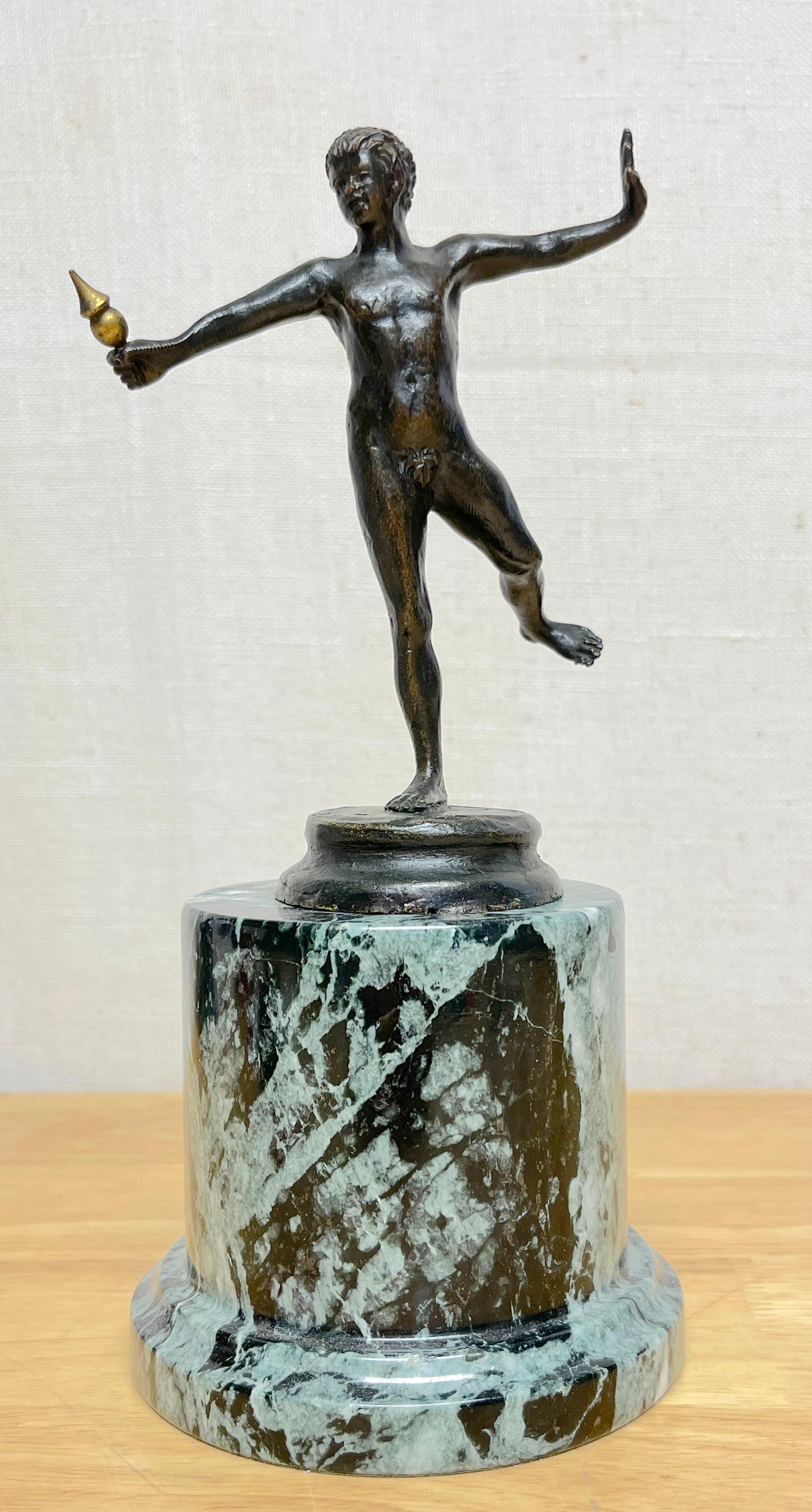 Diminutive Grand Tour bronze 'Balancing Faun' on marble pedestal
Italy, The sculpture circa 1890, the marble pedestal later addition 20th C

A small well executed bronze sculpture of a nude faun standing on one leg with his arms outstretched, in