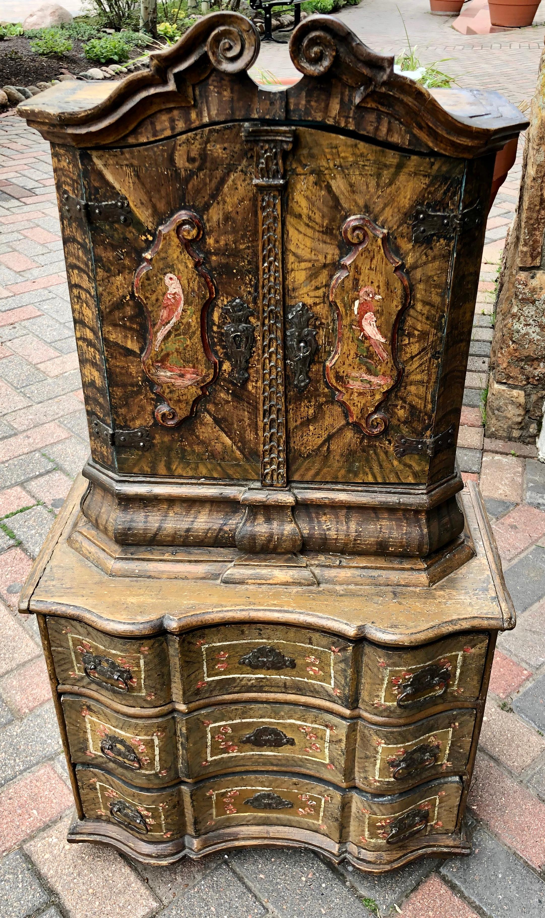 Most likely Austrian, locking top and all the drawers are functional. The piece is in overall very good condition given its age, excellent craftsmanship. This is very rare to find a painted piece or these proportions.