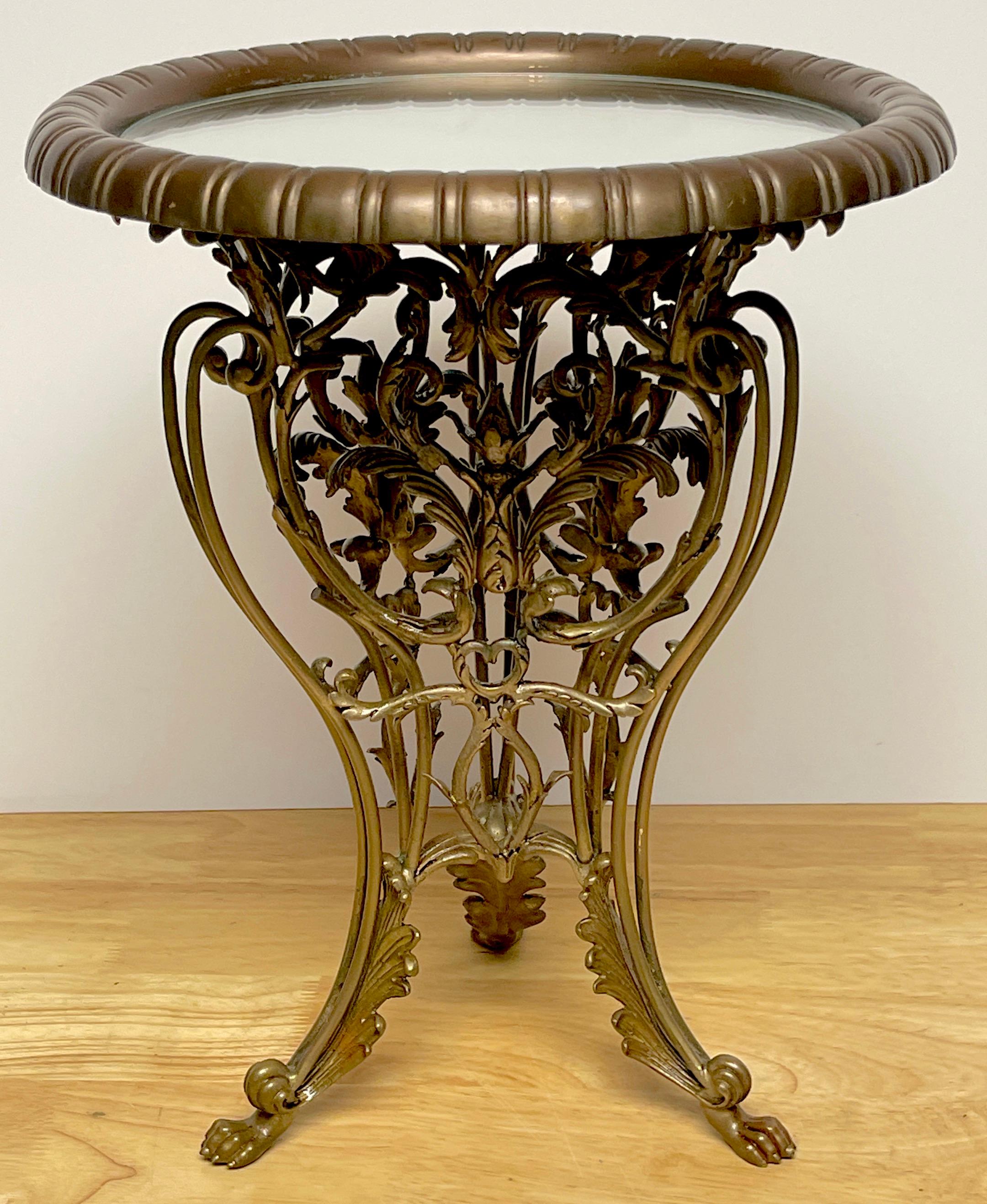 Diminutive Louis XVI style bronze mirror topped gueridon or plateau 

With reeded gallery edge with a 8.5-Inch diameter inset mirror top, resting on a exquisitely cast 8-Inch diameter floral trellis tripartite base raised on paw feet, remnants of