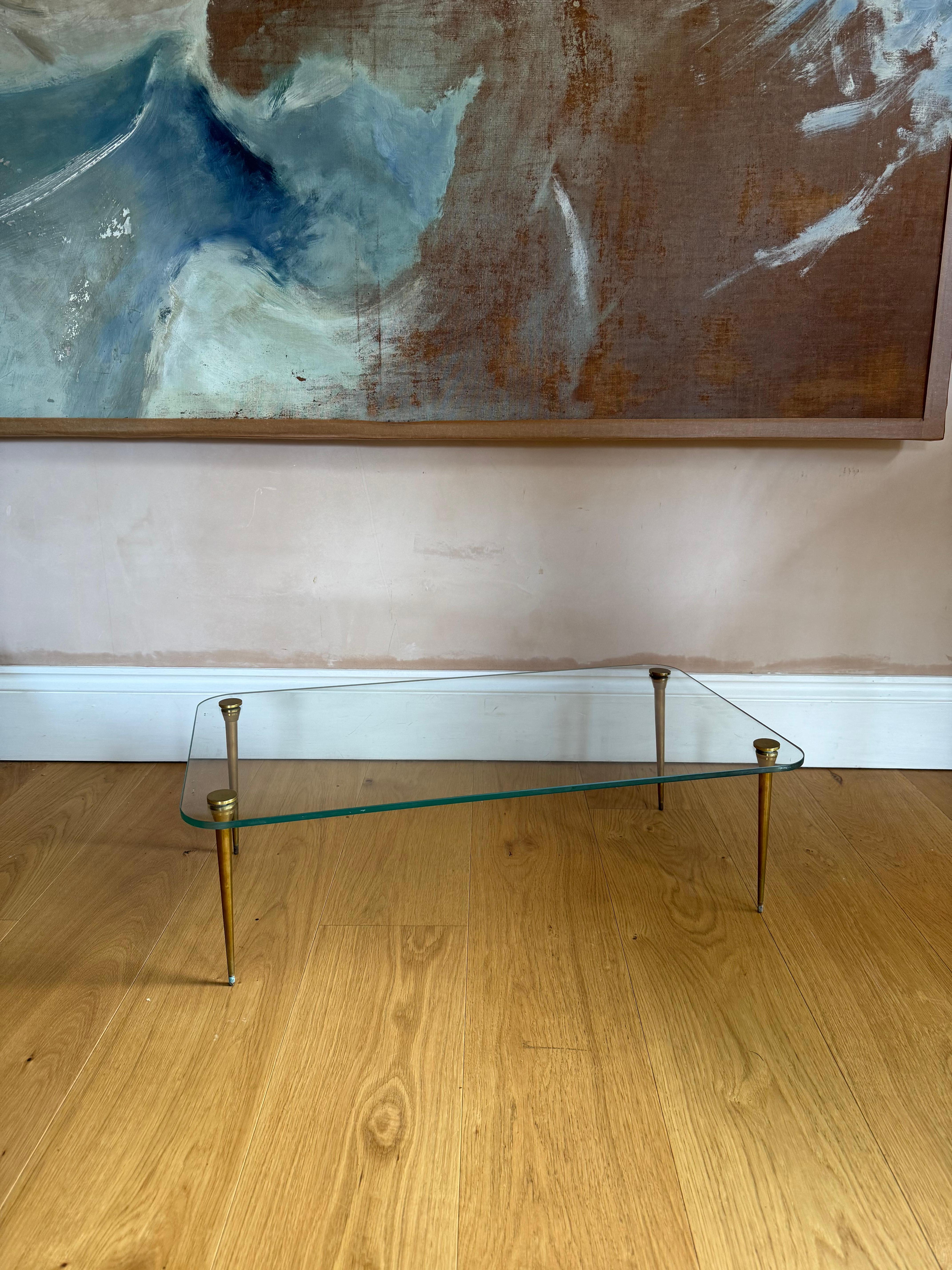 Brass Elegant and Diminutive Low Saint Gobain glass and gilt metal table c.1950's For Sale