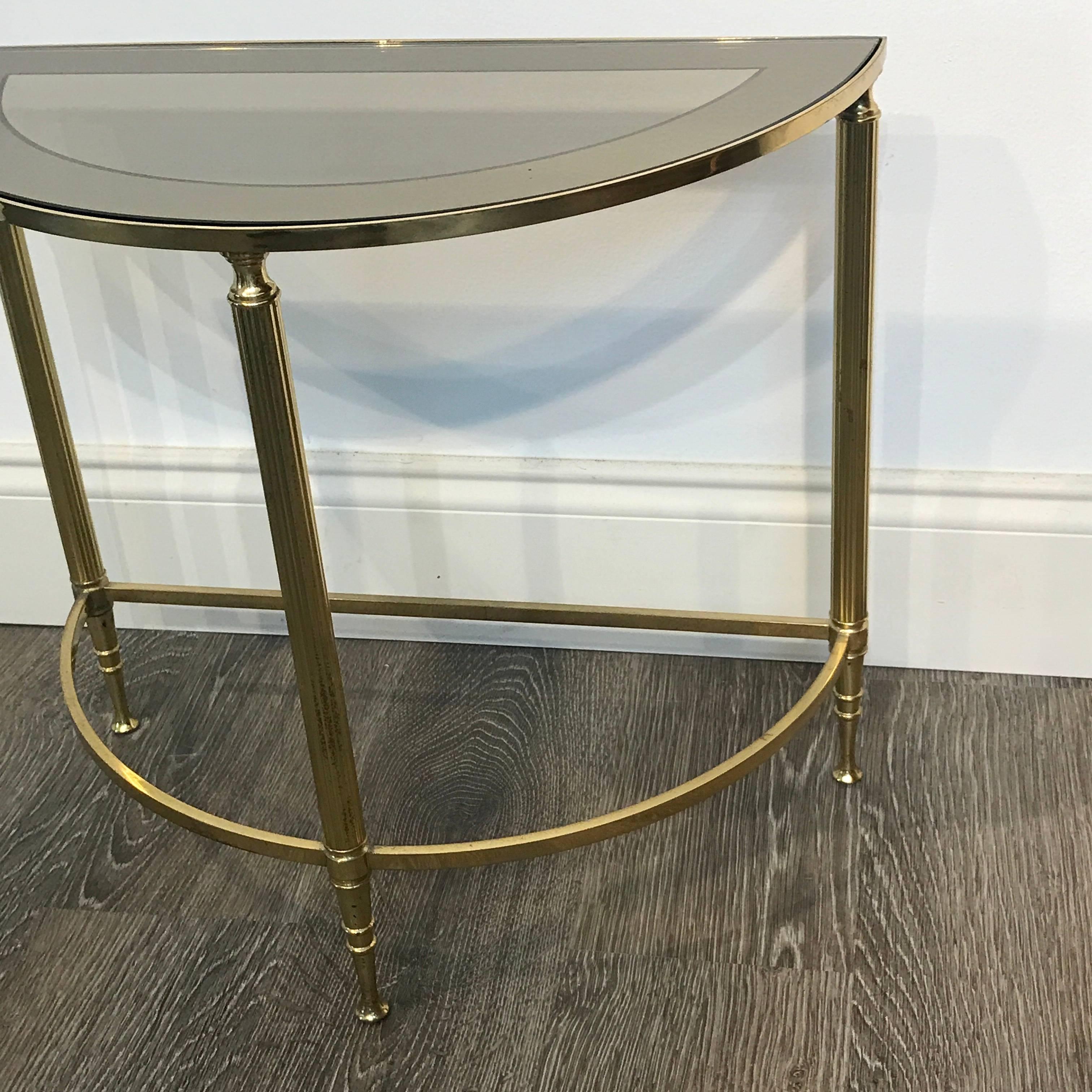 Diminutive Maison Jansen style brass demilune drinks/side table, with removable mirror surround clear glass inset panel.
