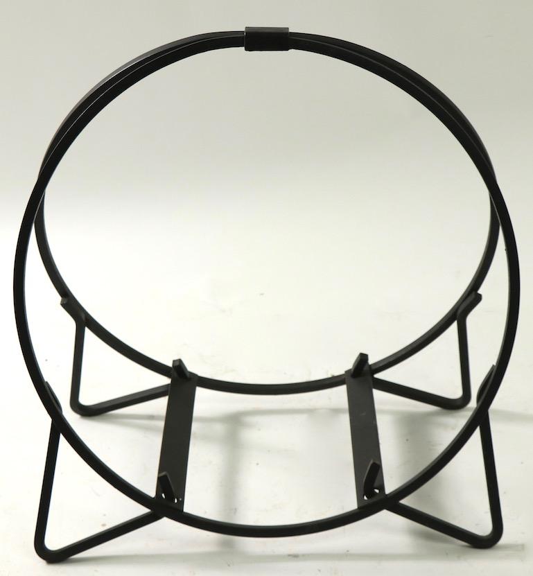 Nice small scale circular log, or kindling wood holder, of solid squared stock wrought iron. Good quality construction, heavy and sturdy. Clean and ready to use condition, suitable for indoor or outdoor use.