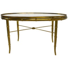 Diminutive Oval Brass and Glass Coffee Table by Mastercraft