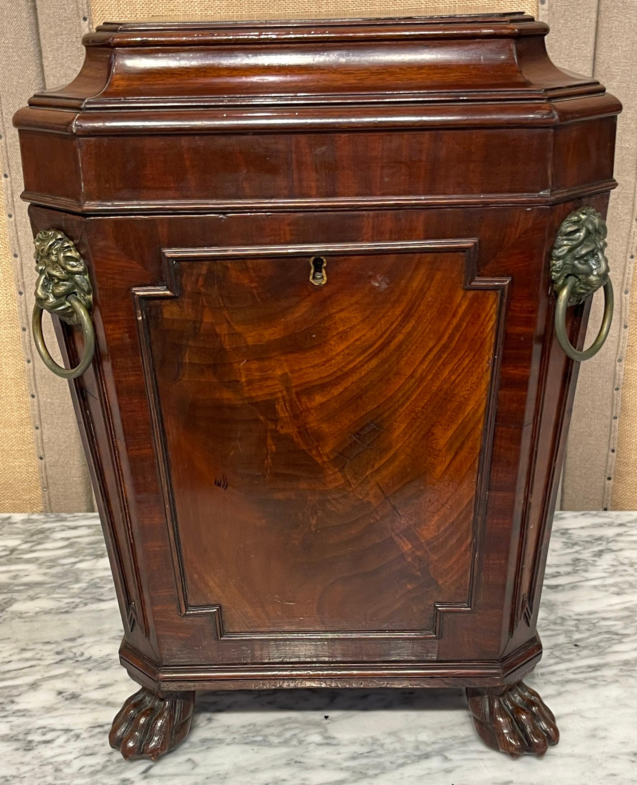 Diminutive Regency Mahogany and Brass Cellarette, Attributed to Gillows & Co.
England, circa 1820

A rare and unusual diminutive Regency mahogany and brass cellarette, attributed to the esteemed cabinetmakers of Gillows & Co., England, circa 1820.