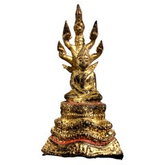 Antique Diminutive Thai Rattanakosin Gilt Bronze Buddha and Naga, 19th Century, Thailand