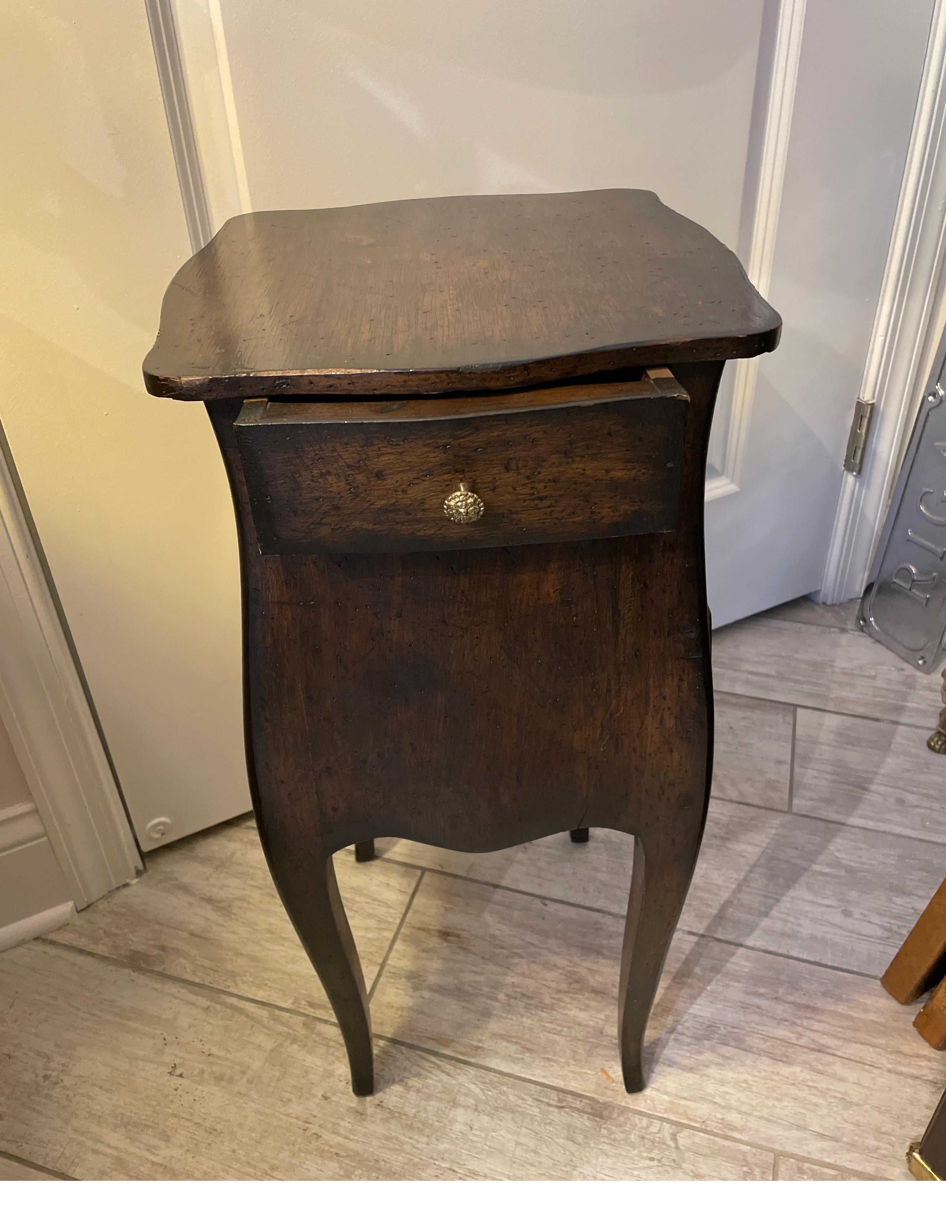 Very sweet diminutive Italian commode / side table. There are two drawers on one side and one drawer on another. A great little drinks table.