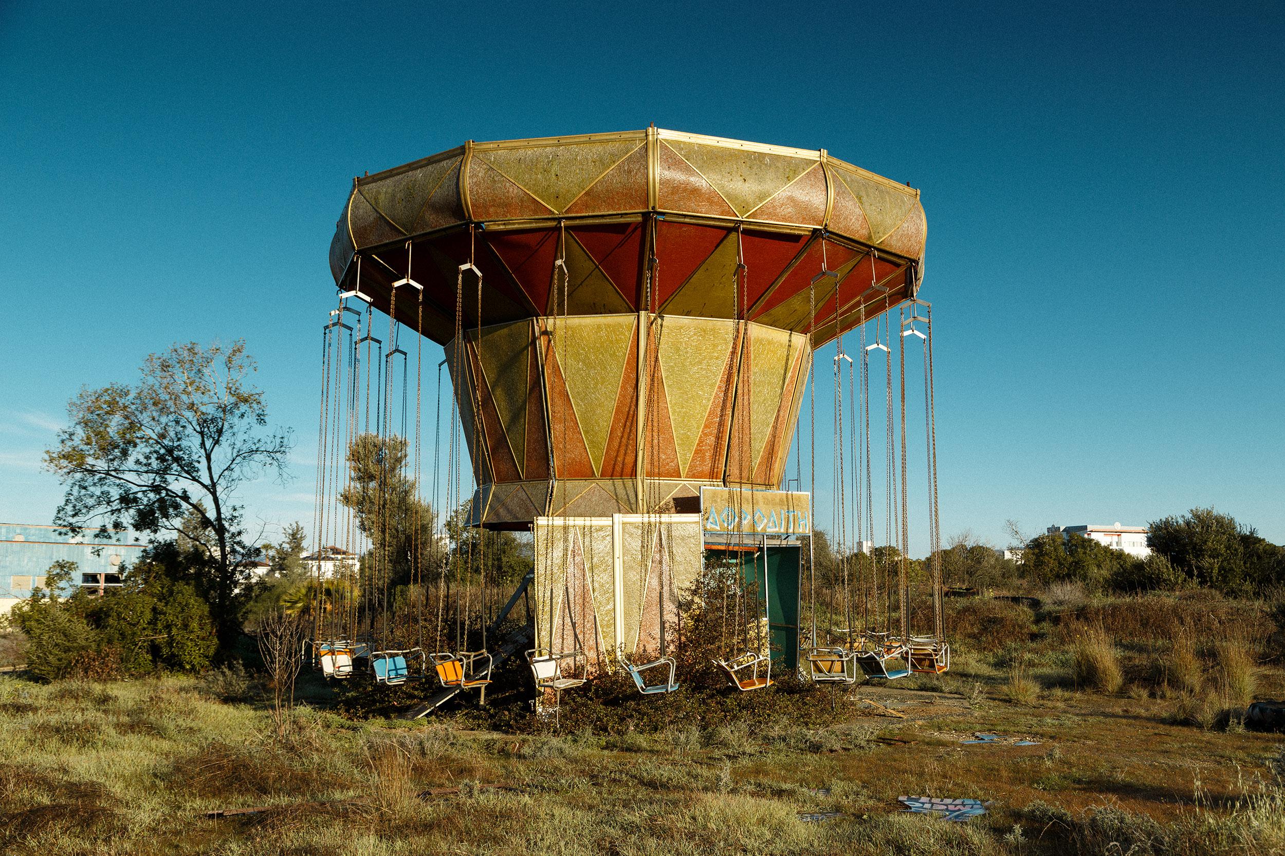"Flying Carousel", photography by Dimitri Bourriau. Print mounted on aluminum with plexiglas, framed. Edition of 15.

Dimitri Bourriau is a French photographer, he has always been interested in history and architectural remains. He explores the