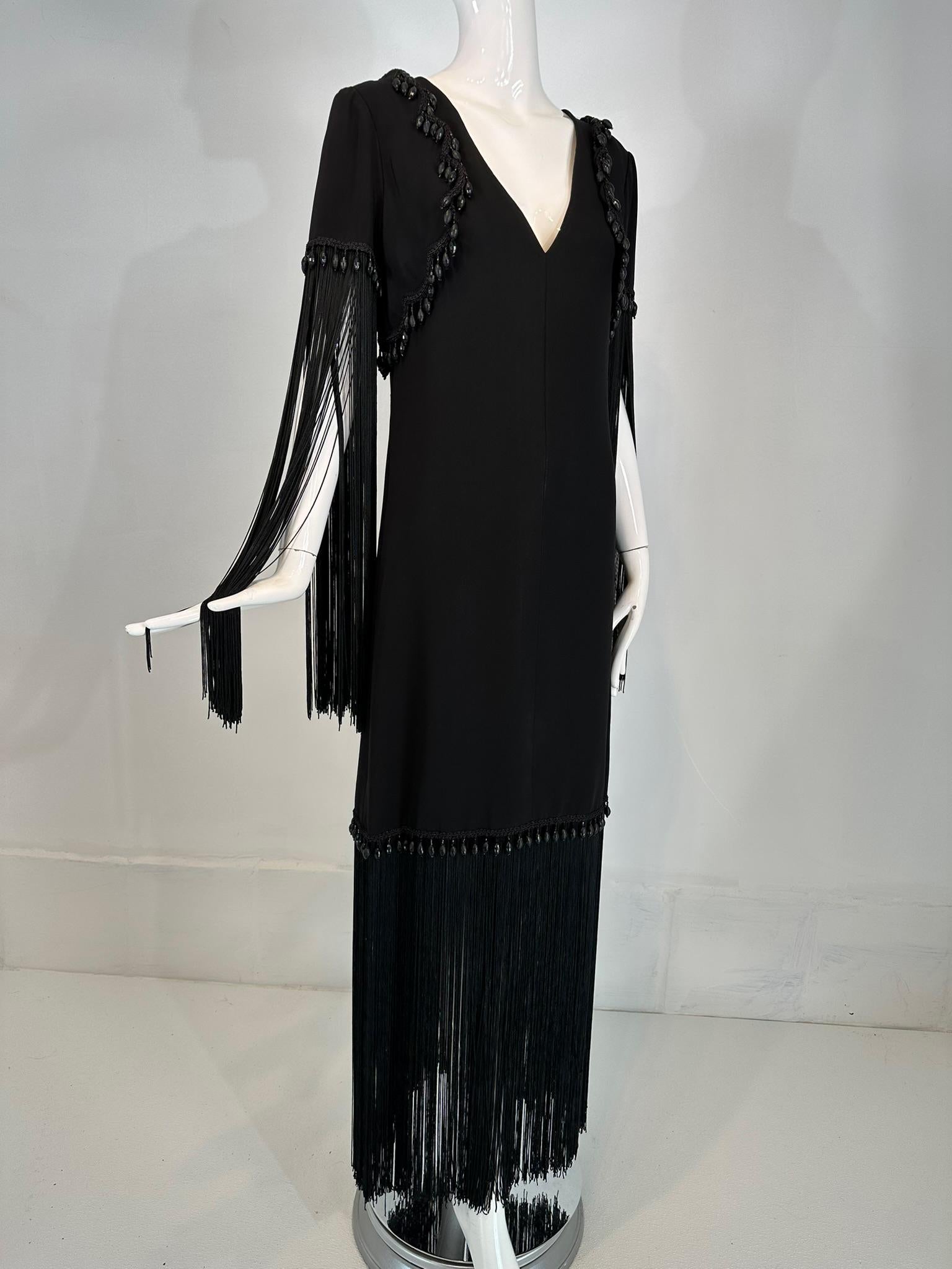 Dimitri Kritsas Haute Couture New York from the 1960s-70s black bead & fringe evening gown. 
This fabulous gown is completely hand made as you would expect, the construction is beautifully executed. The haute hippie design raises the love of fringe
