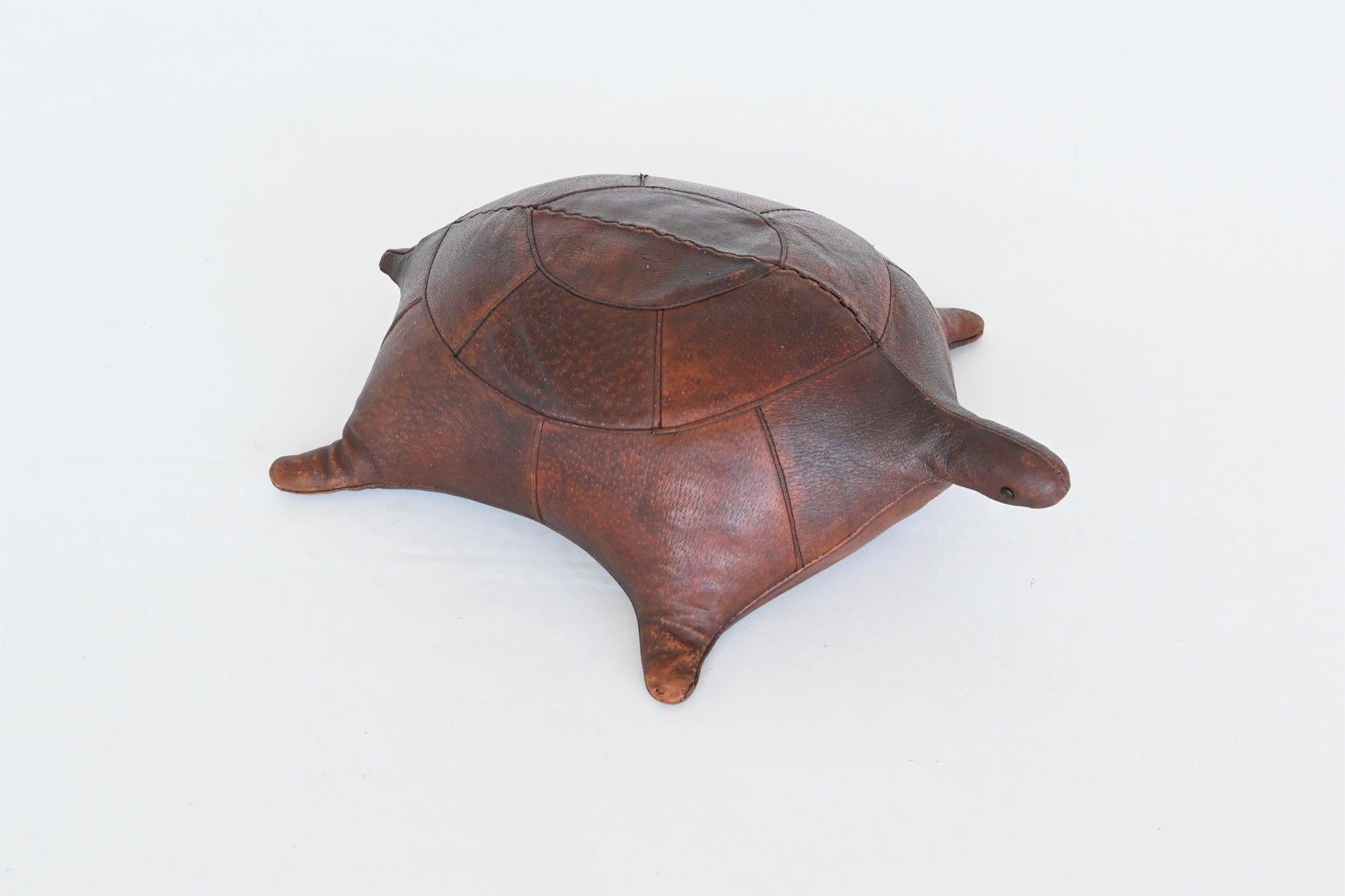 Very nice and highly decorative leather turtle foot stool designed by Dimitri Omersa for Abercrombie & Fitch, United Kingdom 1960. This turtle is one of the rarer animals by Dimitri Omersa. It is made of top quality full grain cowhide leather,