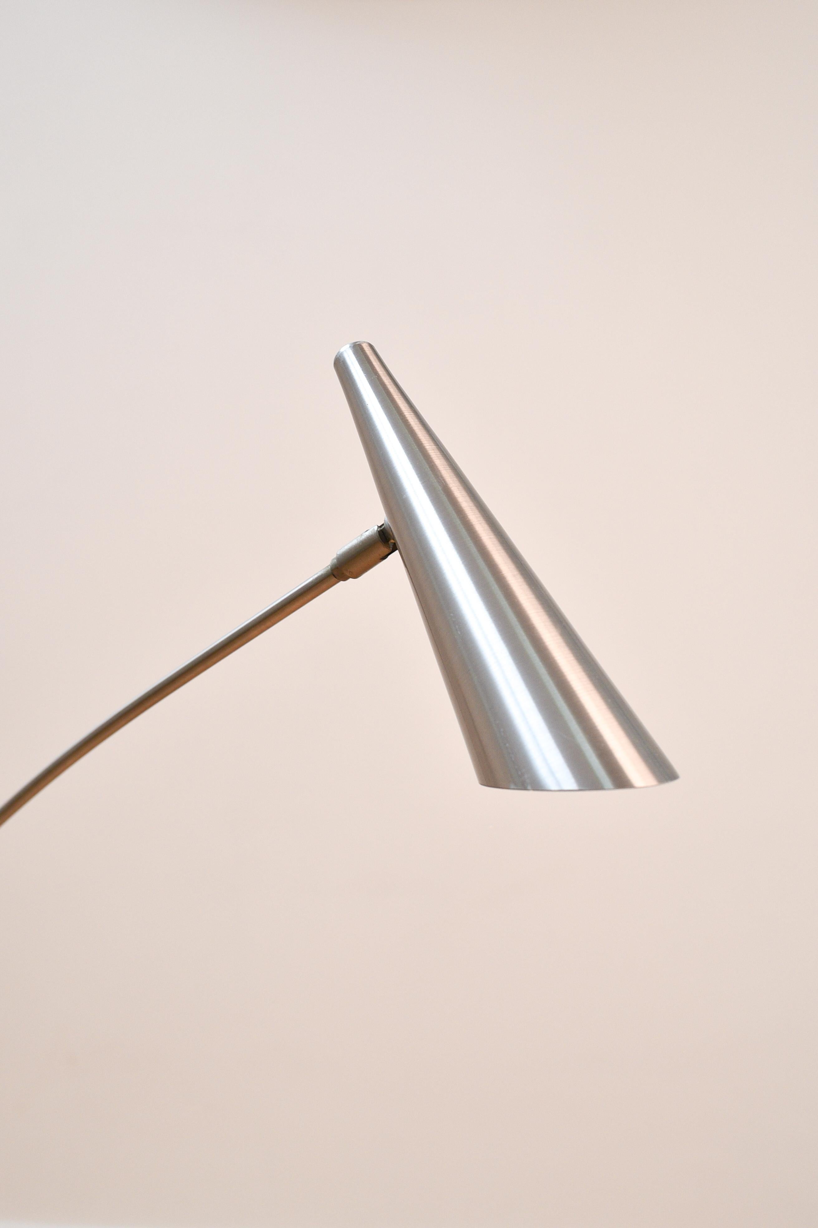 Dimmable floor reading lamp in chrome, made in 1997. Italian design and made in Italy (Genova). 

The chrome has some light scratches - wear consistent with age and use