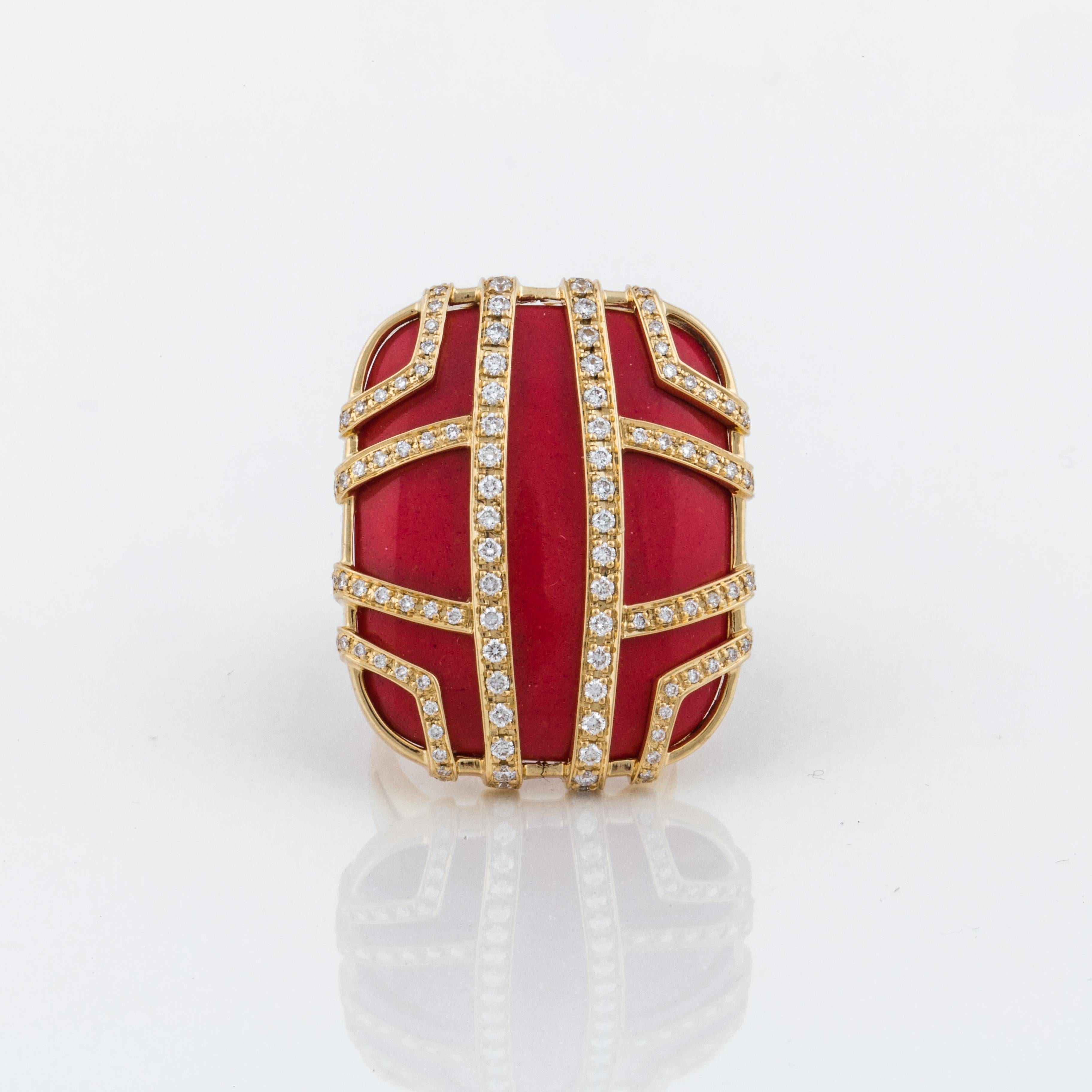 Di Modolo Favola ring is composed of 18K yellow gold and features a coral stone accented by round diamonds.  The ring is marked 