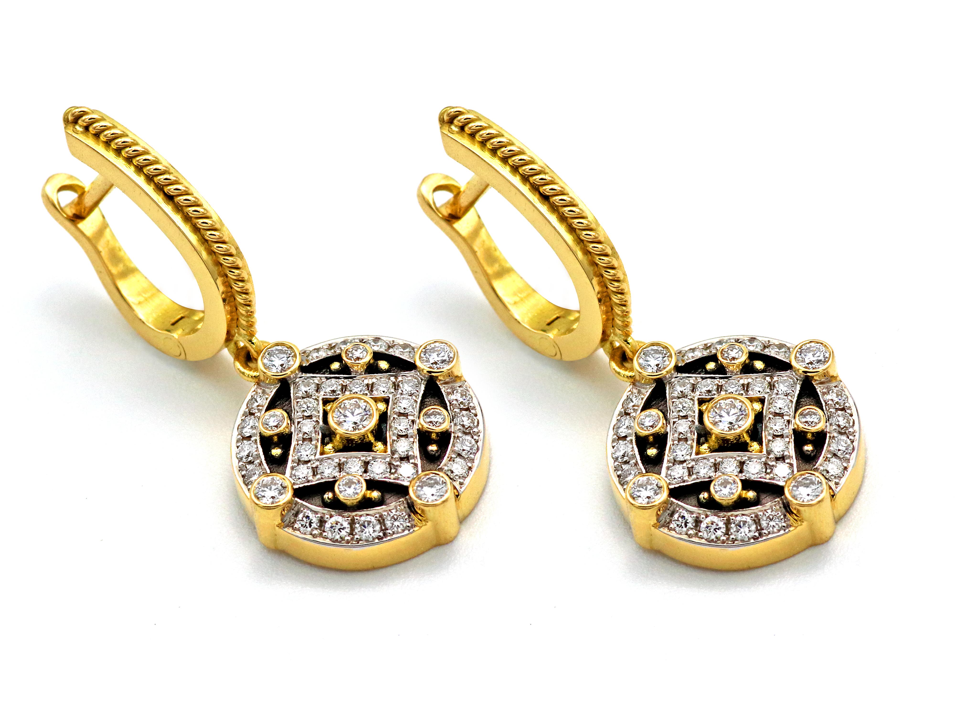 Dangling  Byzantine earrings in 18 karat gold hand made in Athens Greece by Dimos of the Noir Collection, set with 0.80 carat not graded natural brilliant cut diamonds, handmade filigrees and microscopic setting to perfection.  
The clasp it’s a