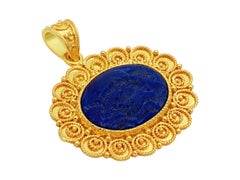 Dimos 18k Gold Lapis Lazuli Pendant with Carved Dolphins
