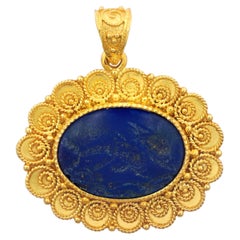 Antique Dimos 18k Gold Lapis Lazuli Pendant with Carved Dolphins