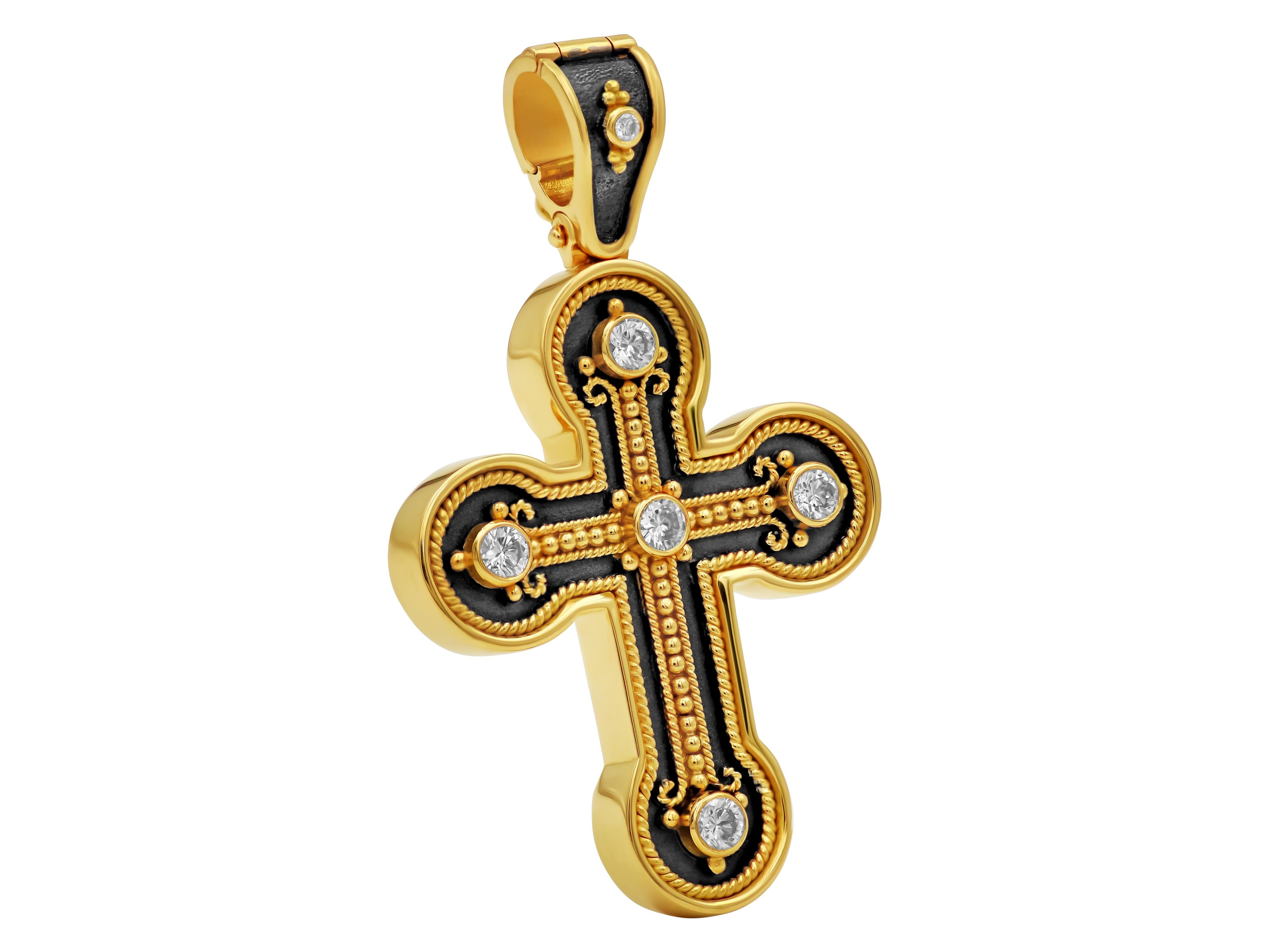 18k yellow gold cross from the Noir collection. Gorgeous workmanship with beautiful details and six 0.52 carats extra white brilliant cut diamonds create this piece. Of course the bezel opens and the finish in the back it makes it even more