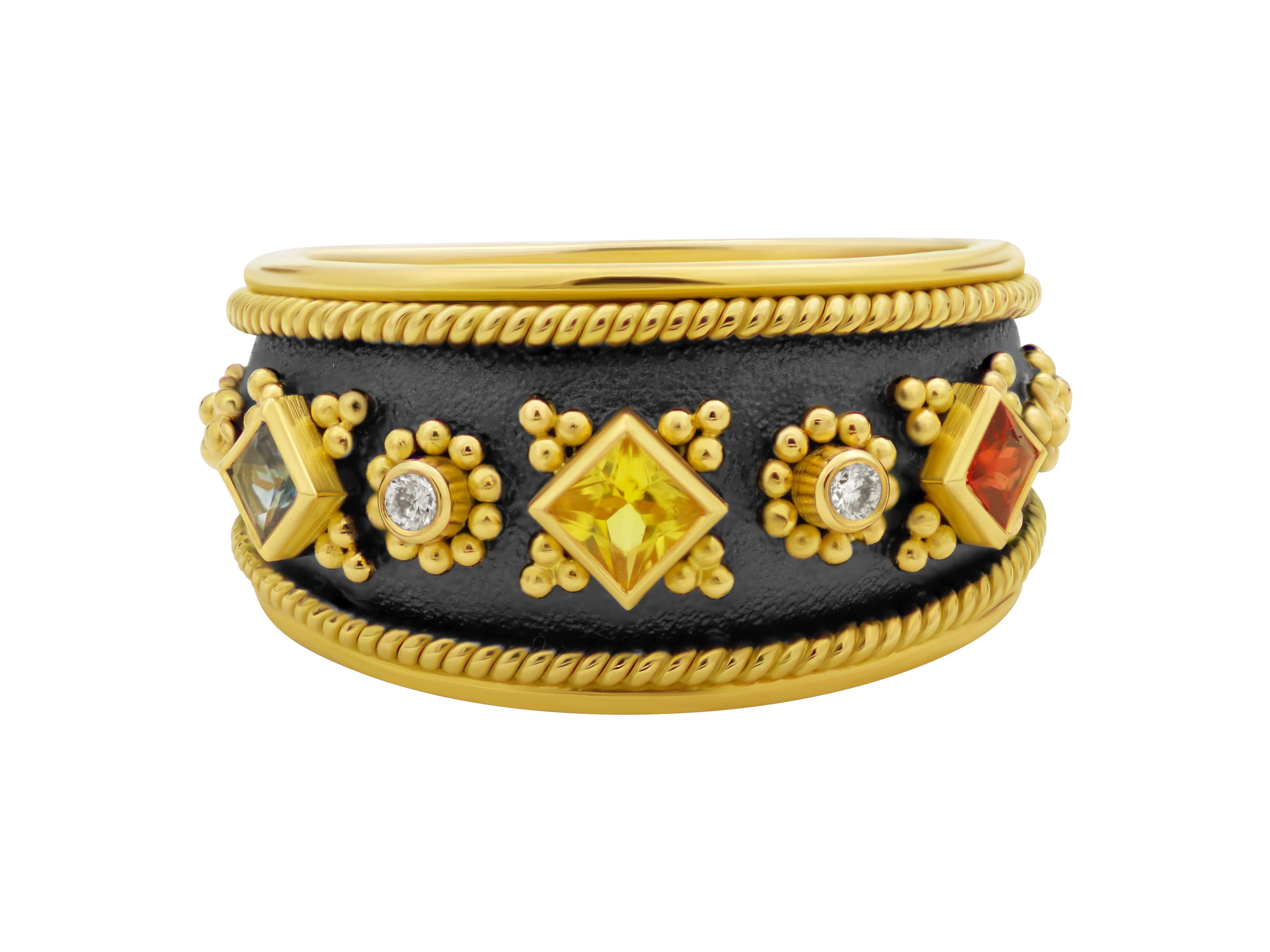 Noir collection ring in 18 karat yellow gold with 0.34 carats multicolor sapphires. Topped with 0.04 carats brilliant cut diamonds filigree frames and granulation decor. The black platinum in the back creates the dramatic effect and show every