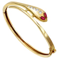 Dimos 18k Gold Snake Bracelet with Rubies and Diamonds