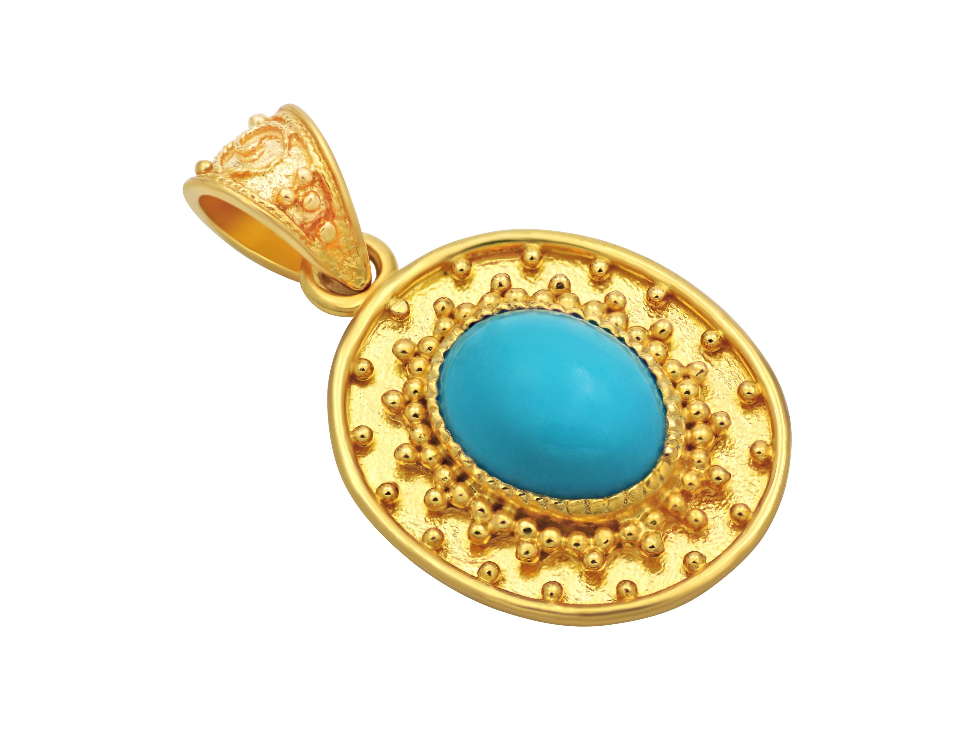 Pendant in 18 karat yellow gold set with a natural turquoise and granulations. A simple and clean piece completely handmade that can be worn 24 /7