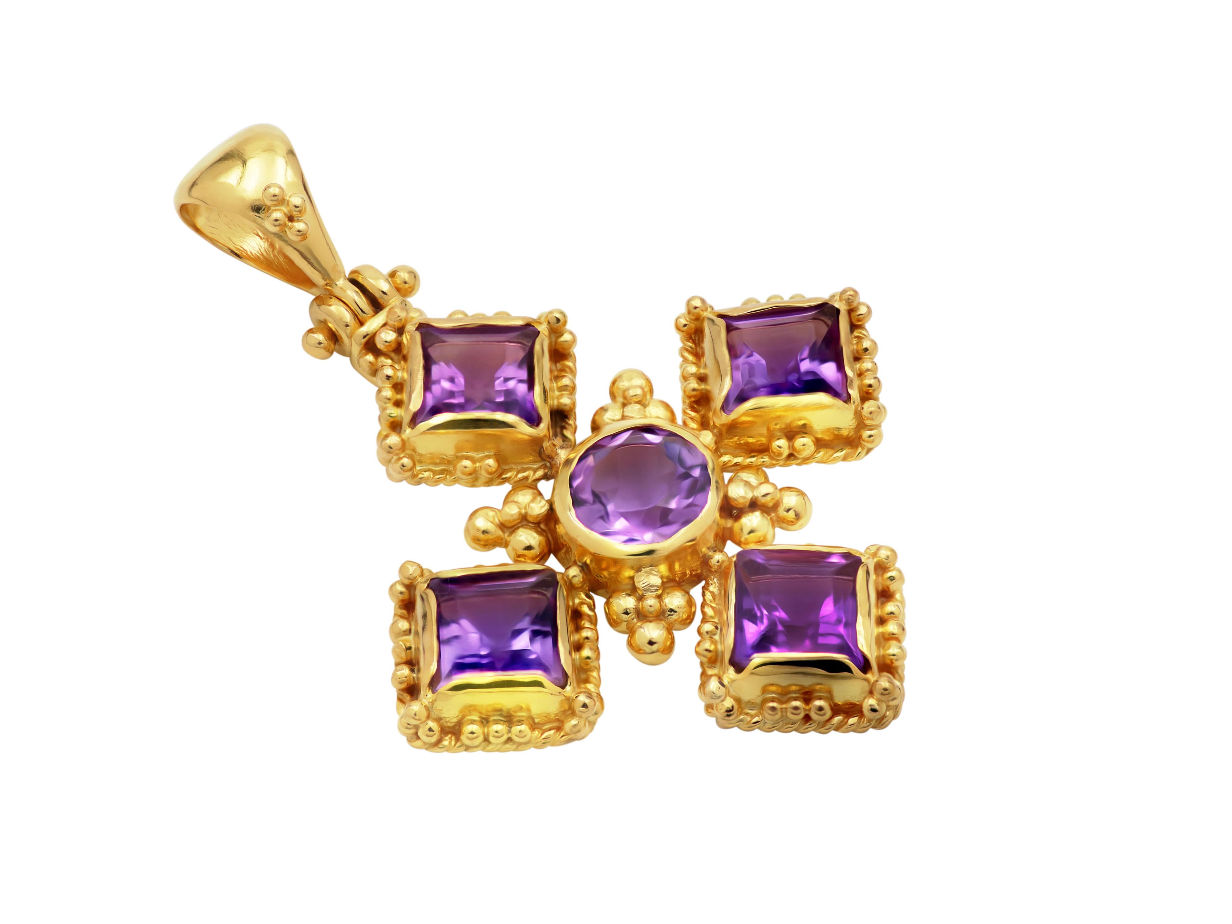 Classic cross completely handmade in the old traditional way in 18 karats gold set with princess cut amethyst decorated with granulation in different sizes.