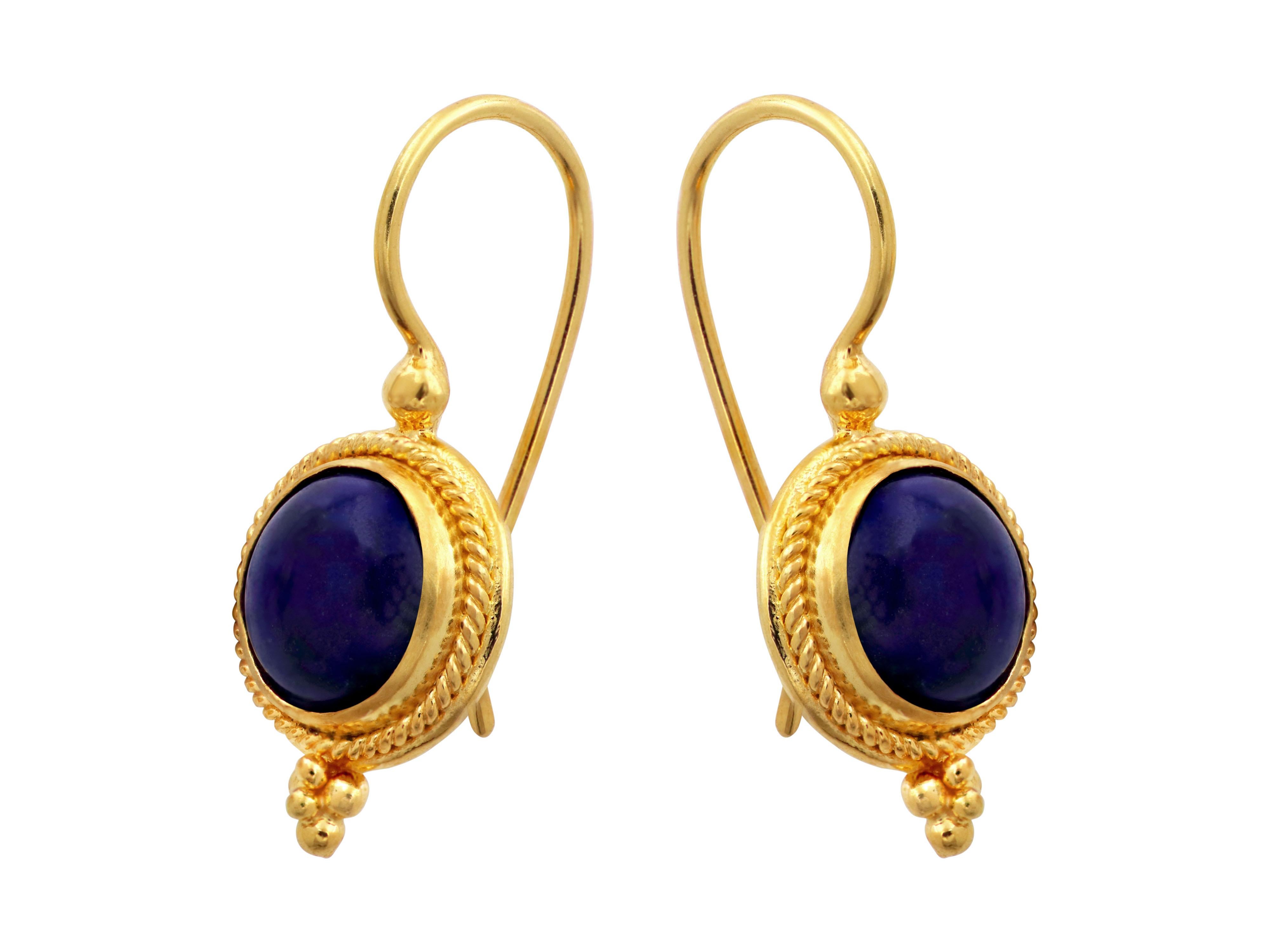 Stunning and luxurious earrings, crafted from 18k gold featuring intricate filigree and granulation decoration. The focal point of the design is the beautiful Lapis Lazuli gemstones, which add a pop of rich blue color to the earrings. The
