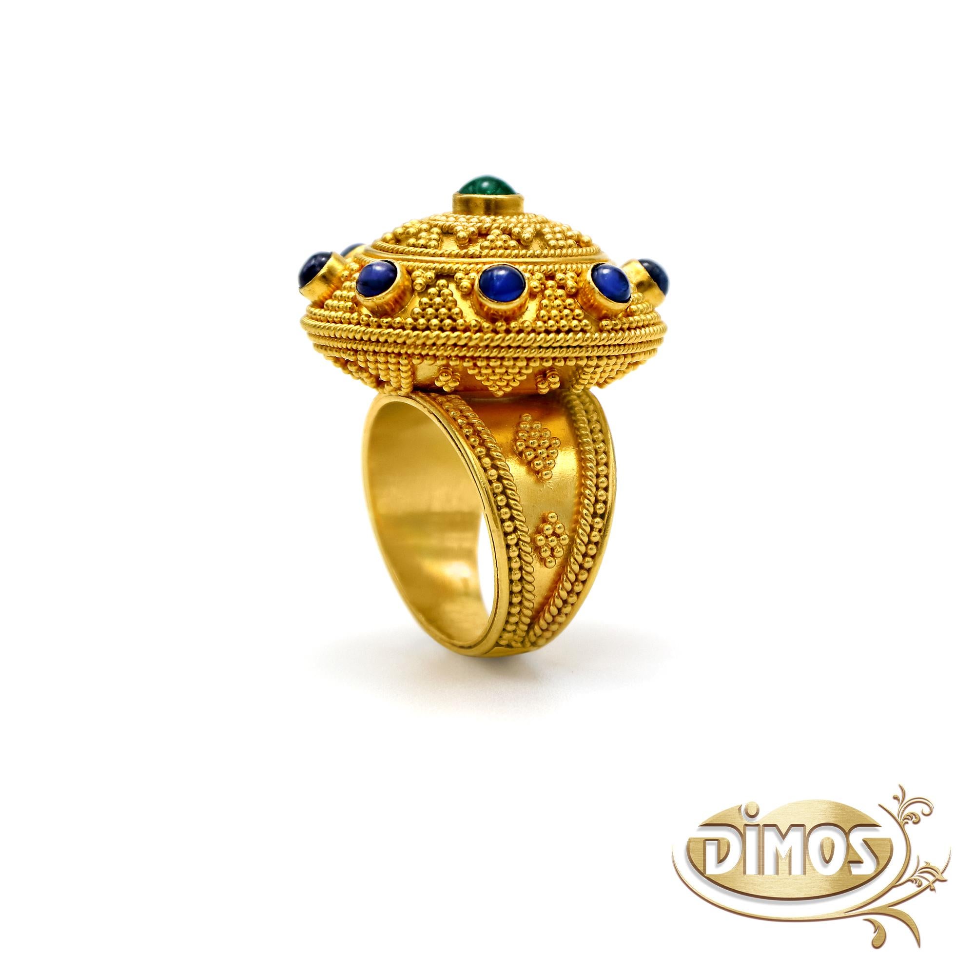 The ring of mobile art. A dome 22k gold creation based of museum work and a high level of workmanship skill that it takes years to achieve. The granulation work covers the whole ring and even the bottom part of the dome. The cabochon stones 1.60