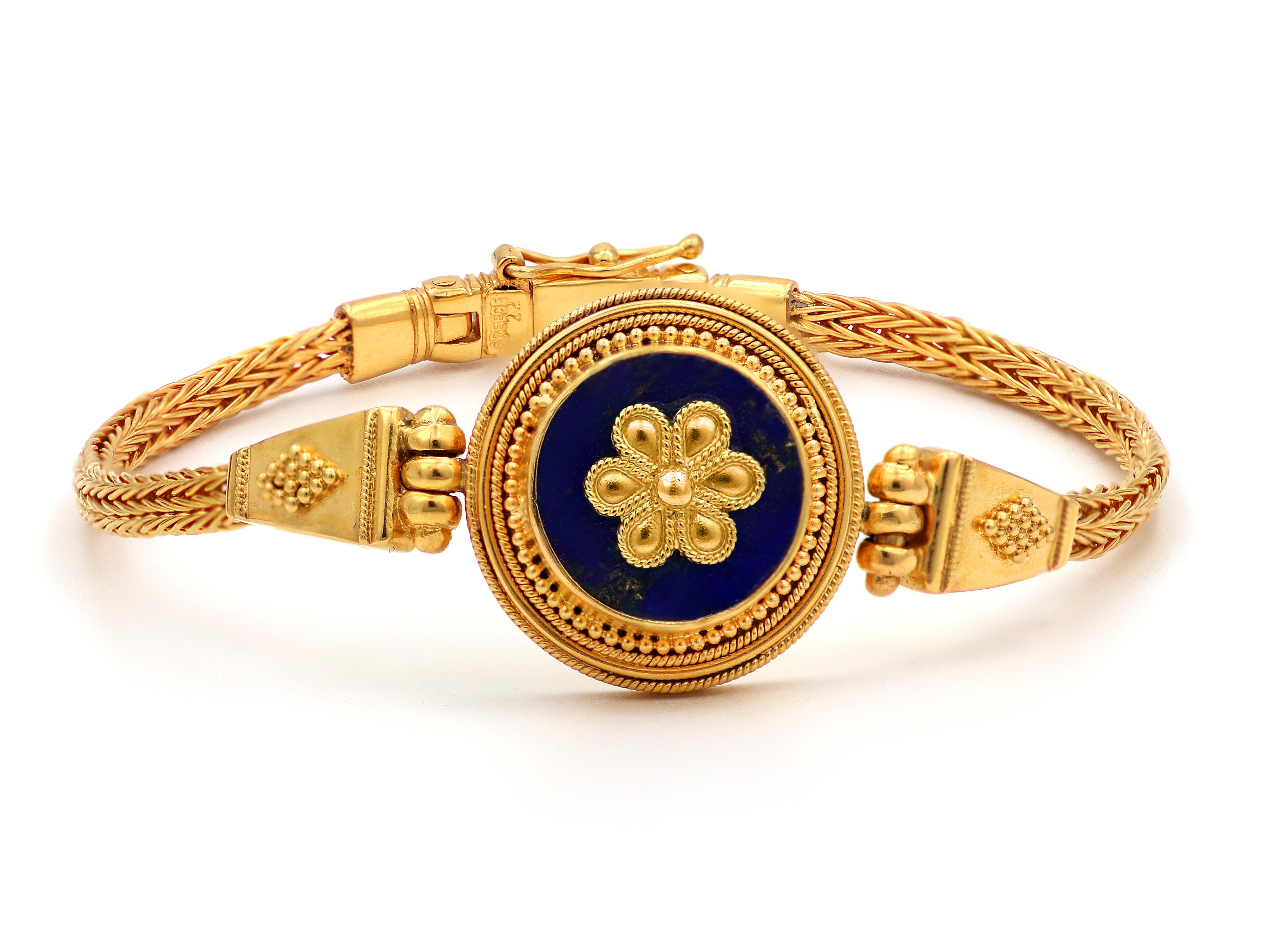 22k gold Kyklos Bracelet. This creation is so divine and perfect that we call it Kyklos, circle in En. As perfect and harmonic is a circle is exactly that design. A neoclassical era with several circles of filigree wires granulation and round Lapis