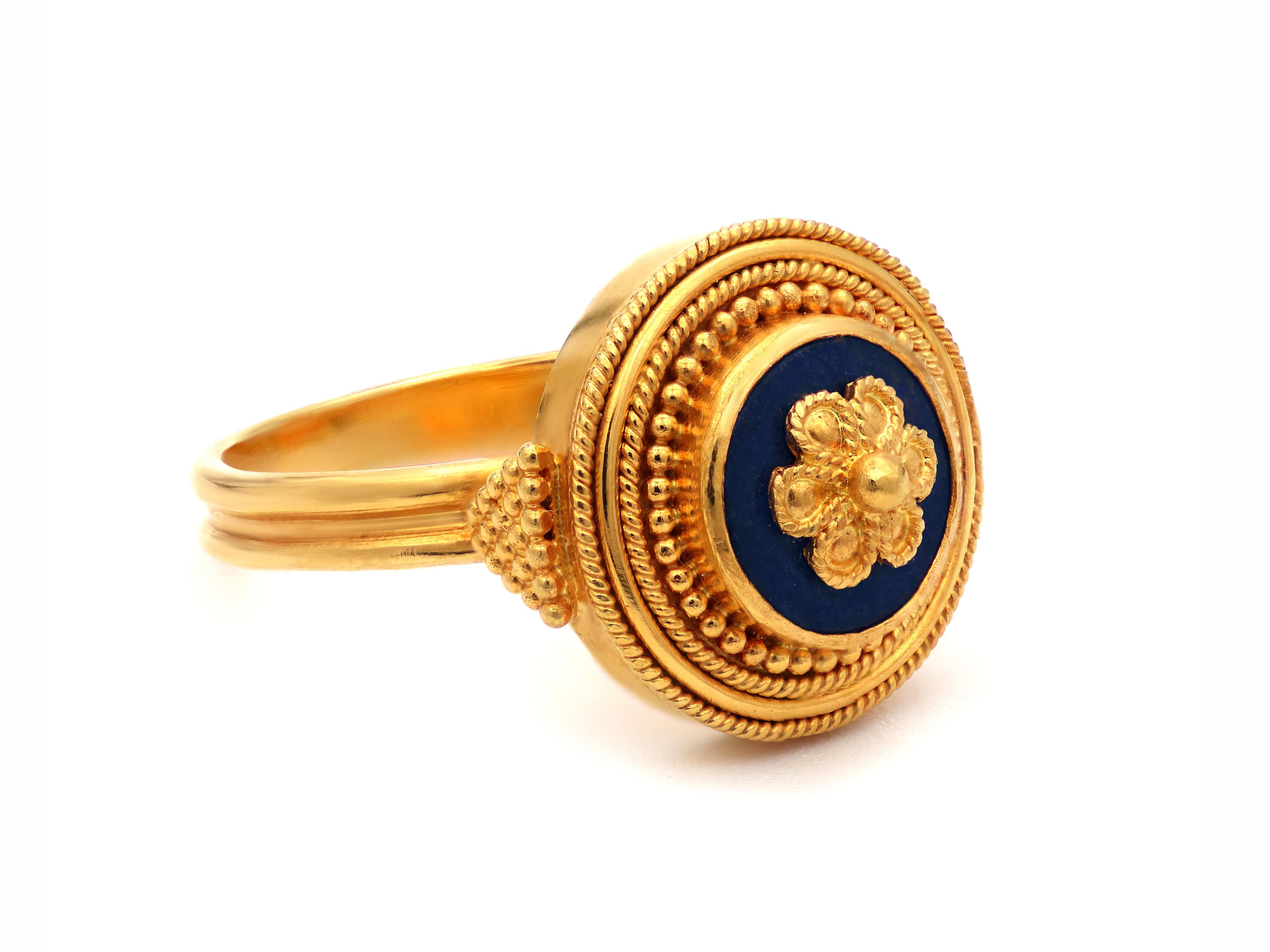 22k gold Kyklos ring. This creation is so divine and perfect that we call it Kyklos, circle in En . As perfect and harmonic is a circle is exactly that design. A neoclassical era with several circles of filigree wires granulation and round Lapis