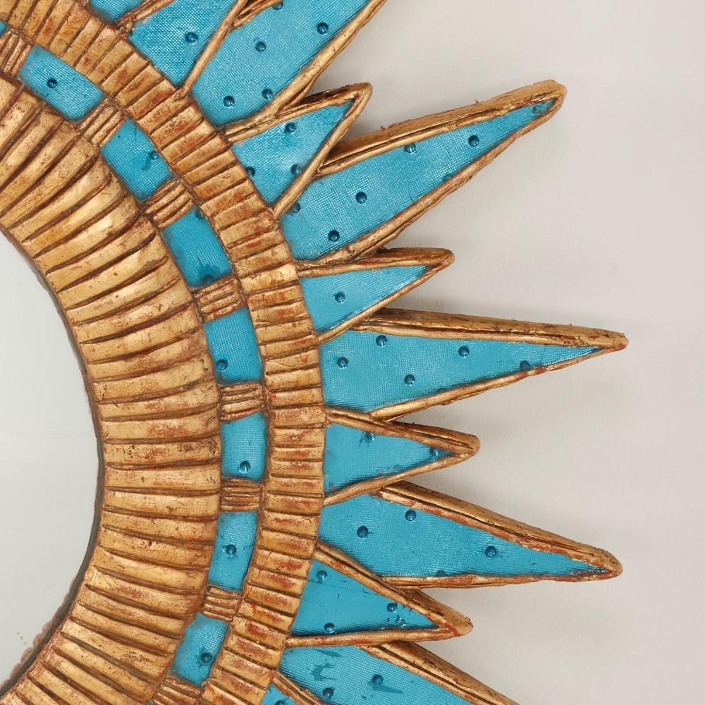 Argentine A Dimpled Blue Glass & Resin Convex Sunburst Mirror. For Sale