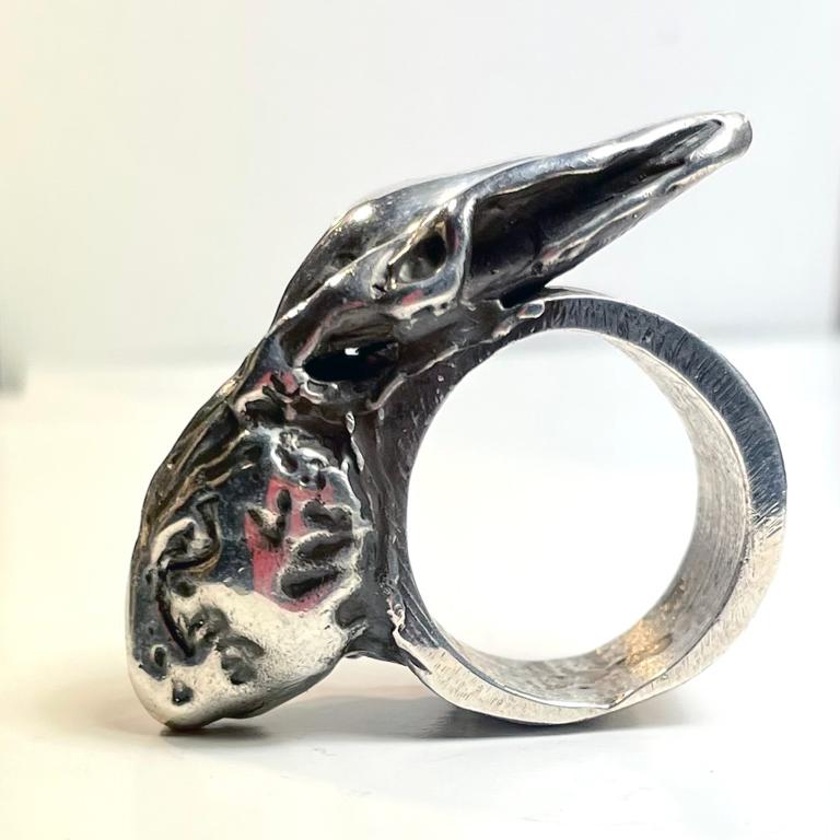 Melted Rabbit in Sterling Silver ring. The artists hand is present in every touch of this sculptural work.
The ring is Size :#9
The Material is sterling silver with polished and oxidized finish treatments.

This solid piece weighs 58 grams. The