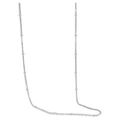 Dina M. 14kt white gold, 36" opera diamond necklace featuring 15.63